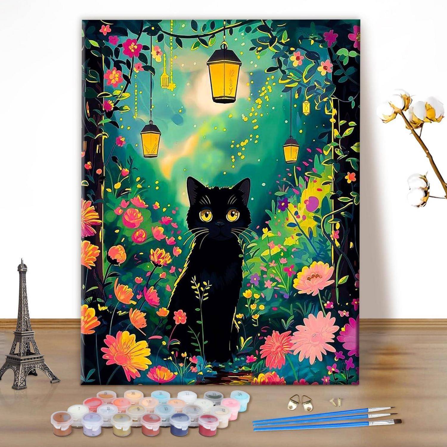 Schwarze Katze gemälde in einem farbenfrohen blumengarten mit hängenden laternen, dargestellt als malen-nach-zahlen-set mit pinseln und farbdosen.