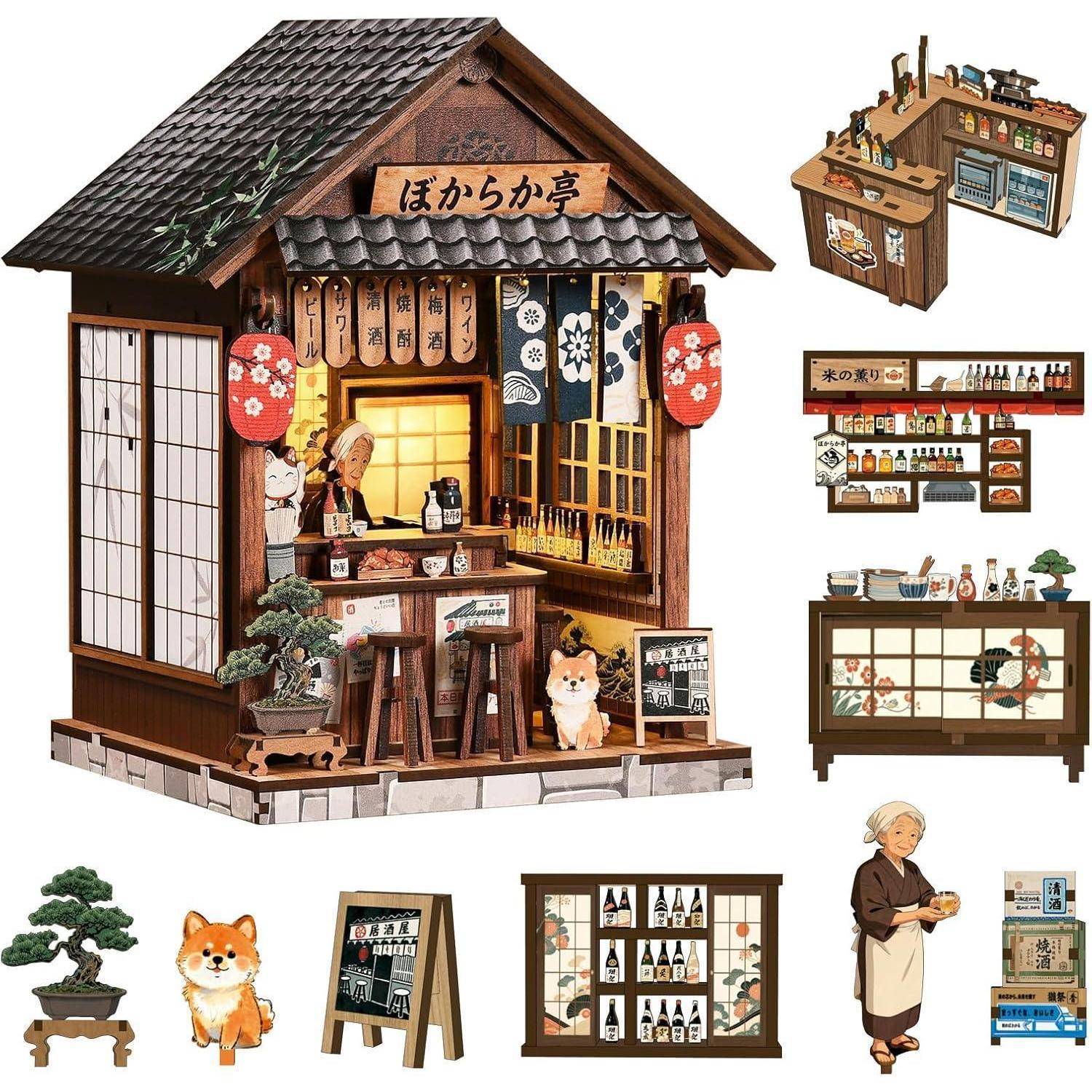 Japanisches Miniatur-Restaurantmodell mit separaten Zubehörteilen, einschließlich einer Theke, Regale, Schilder, ein Bonsai, eine Hundefigur und eine Figur eines älteren Angestellten.