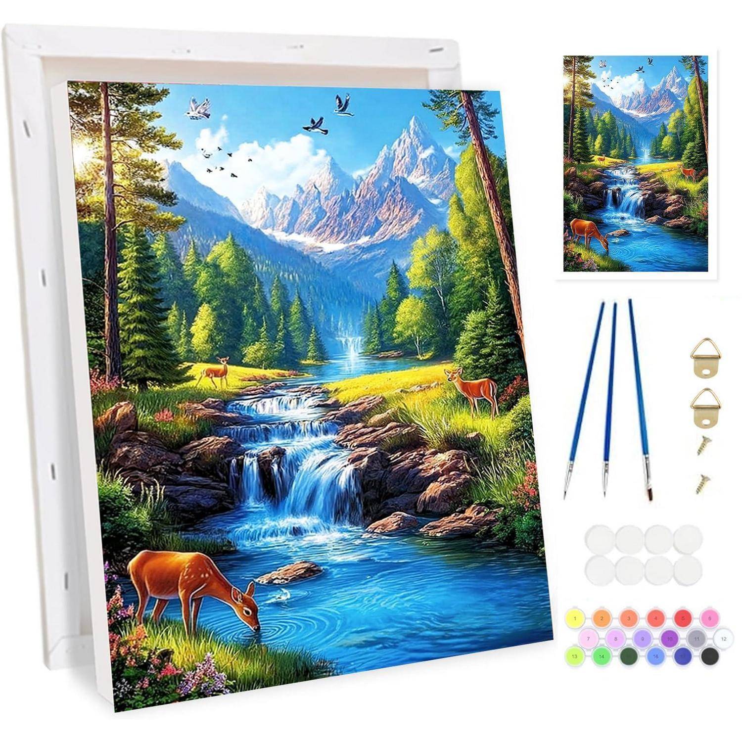 Malset mit einer Landschaftsszene von Bergen, Wald, Wasserfall und Hirsch, gezeigt auf einer gespannten Leinwand mit Pinseln und Malmitteln im Lieferumfang enthalten.