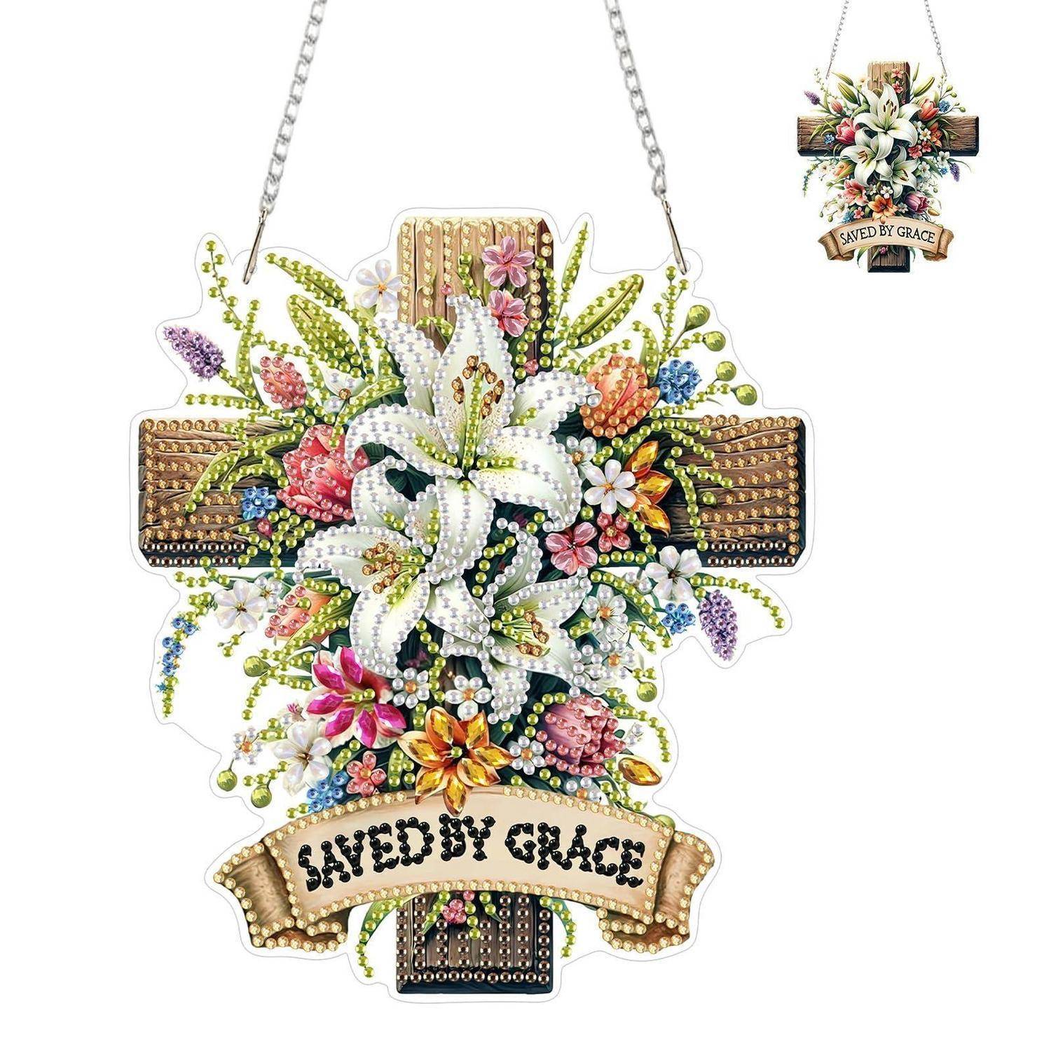 Perlenverzierter Blumenkranz mit weißen Lilien und einem Banner mit der Aufschrift „SAVED BY GRACE