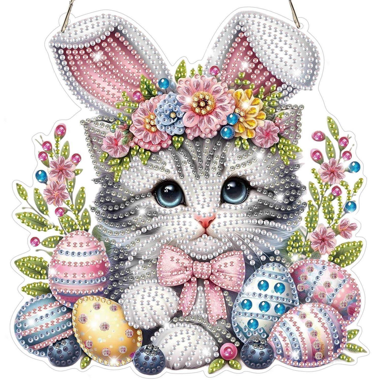 Dekorativer Osterhase mit Perlenperlen, Blütenkrone, rosa Schleife und farblich bemalten Eiern.