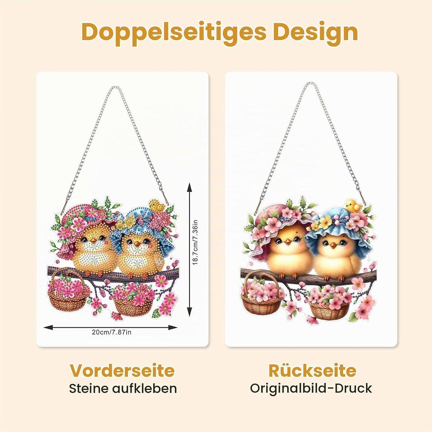 Produktvergleichsbild einer umkehrbaren Vogel- und Blumenhängdekoration: Die Vorderseite verwendet aufklebbare Steine, die Rückseite zeigt das originalgedruckte Bild; Abmessungen 20 cm mal 18,7 cm.