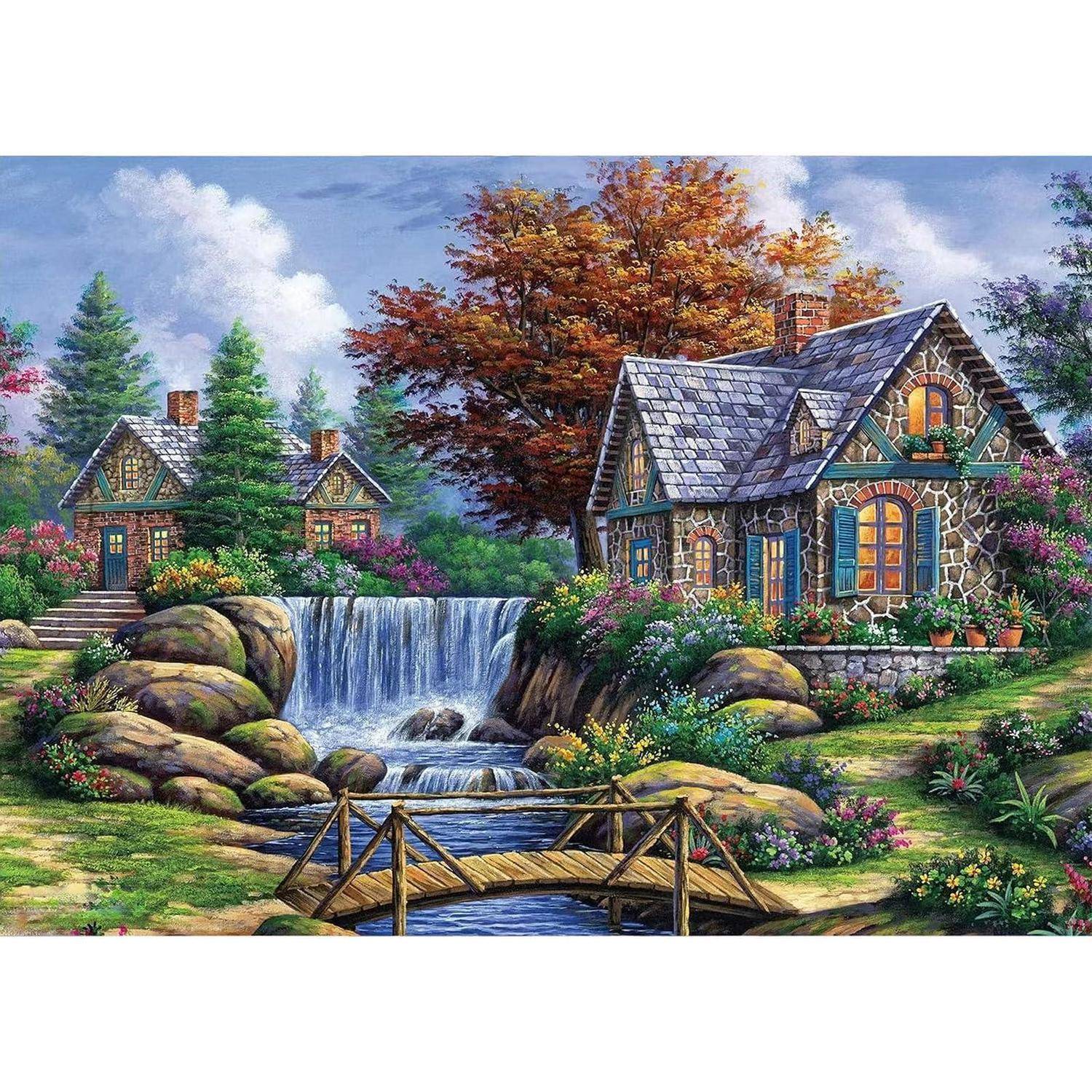 Zwei Cottages im Steinbaustil neben einem Wasserfall und Bach, mit einer kleinen Holzbrücke, farbenfrohen Blumen und Herbstbäumen in einer friedlichen Gartenlandschaft.