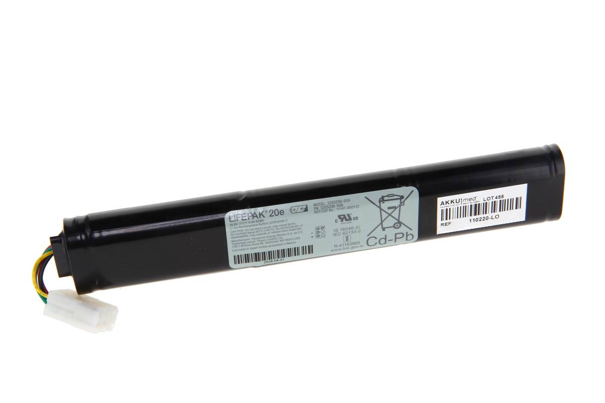 Schwarzes zylindrisches Batteriepaket mit angefügtem Stecker und Etiketten, dargestellt auf weißem Hintergrund.