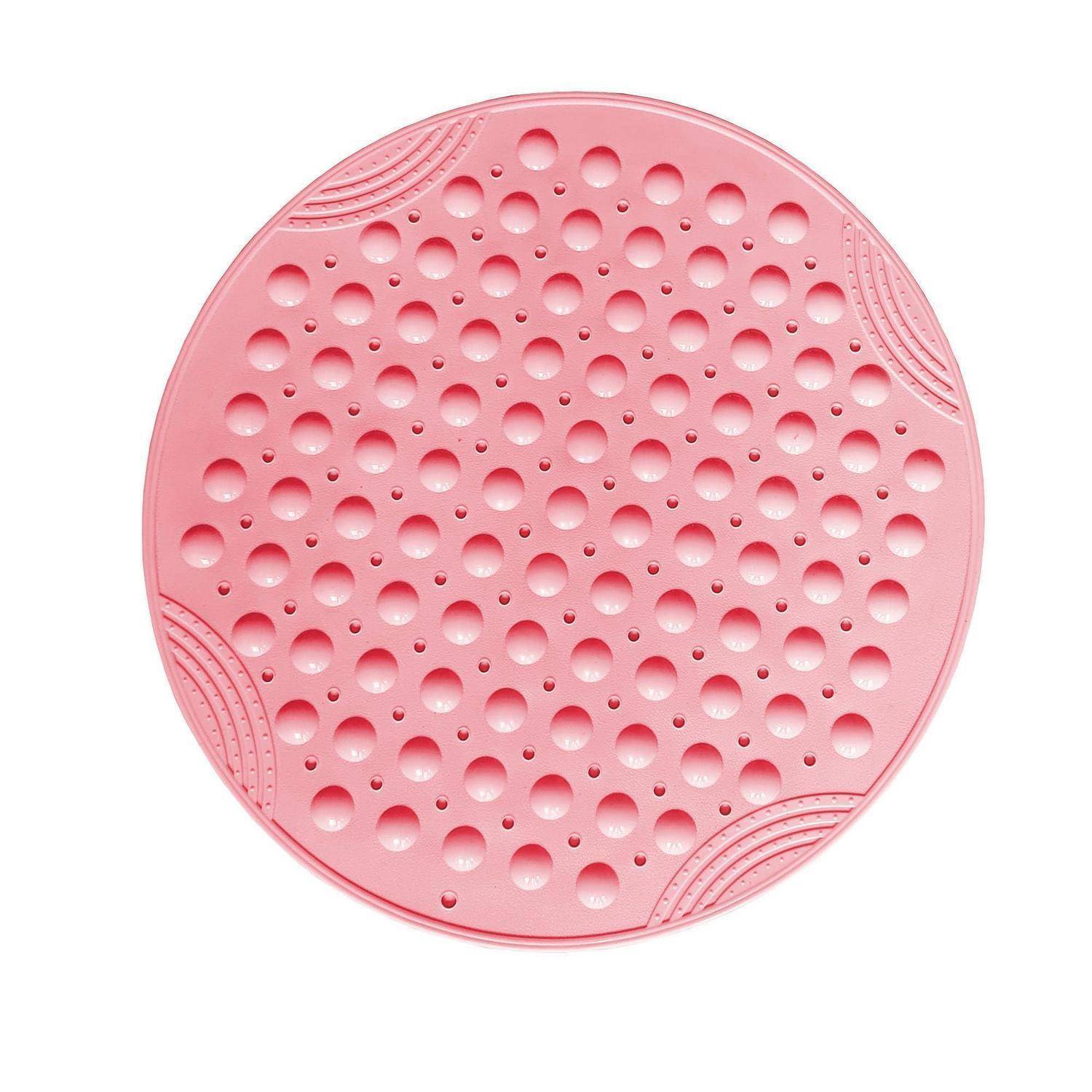 Rosa runde Silikonmatte mit vielen erhabenen Löchern und strukturiertem Rand, auf weißem Hintergrund dargestellt.