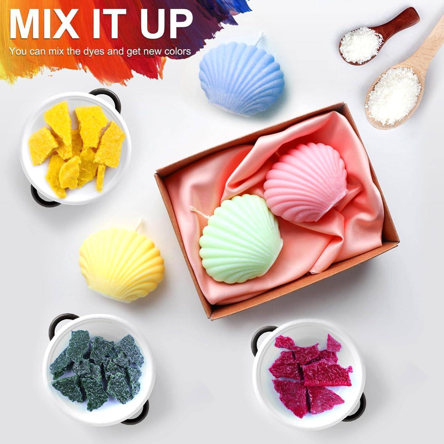Bunte muschelförmige Seifen oder Badebomben in Pastellfarben, die in einer Schachtel und in Schüsseln angeordnet sind, mit dem Text „MIX IT UP