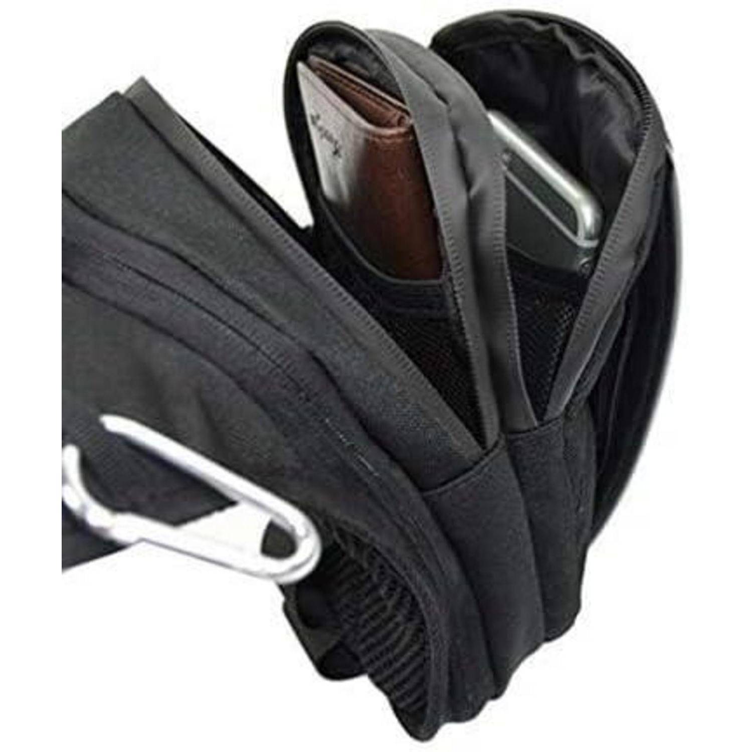 Schwarze kompakte Geldbörse oder Tasche mit mehreren offenen Taschen, die eine braune Kartenhalter und ein silbernes Objekt enthält, gezeigt auf weißem Hintergrund.