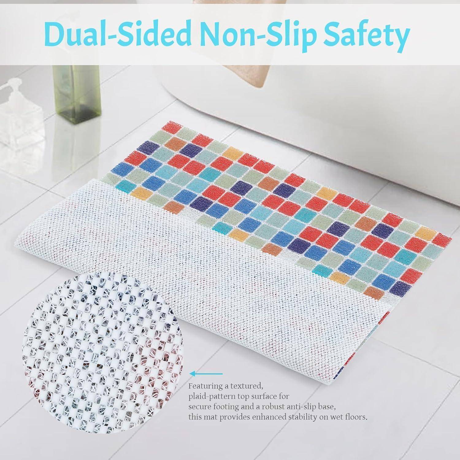 Produktbild einer farbenfrohen rechteckigen Badematte mit der Bezeichnung „Dual-Sided Non-Slip Safety", die eine strukturierte Oberseite und eine rutschfeste Unterseite für sicheren Halt auf nassen Böden zeigt.