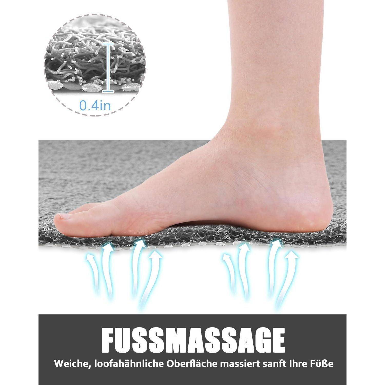 Fuß auf gepolsterter Matte mit der Bezeichnung „FUSSMASSAGE"; die Vergrößerung zeigt eine 0,4 Zoll dicke strukturierte Oberfläche zur sanften Fußmassage.