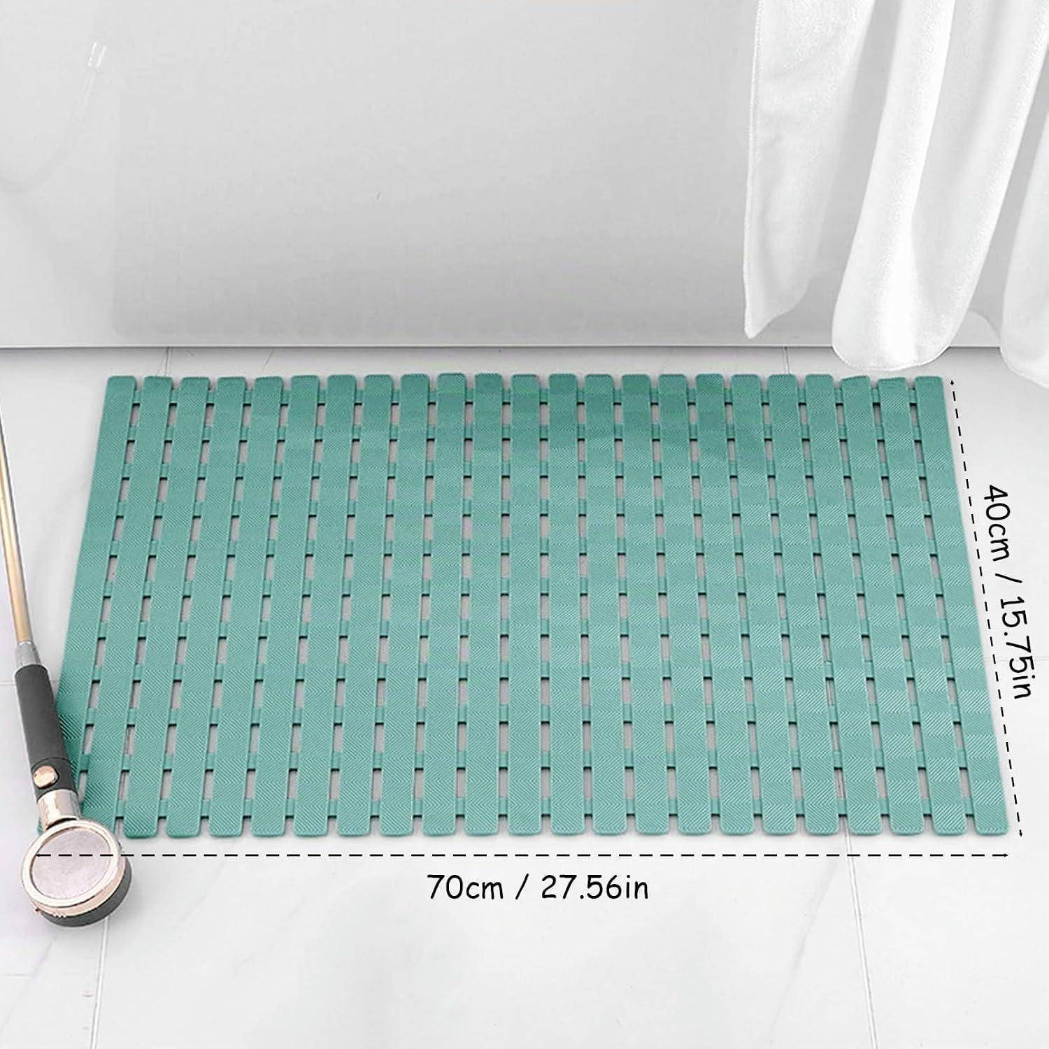 Tealblaue rechteckige Badezimmermatte auf einem Fliesenboden, gezeigt mit den Abmessungen 70 cm × 40 cm.