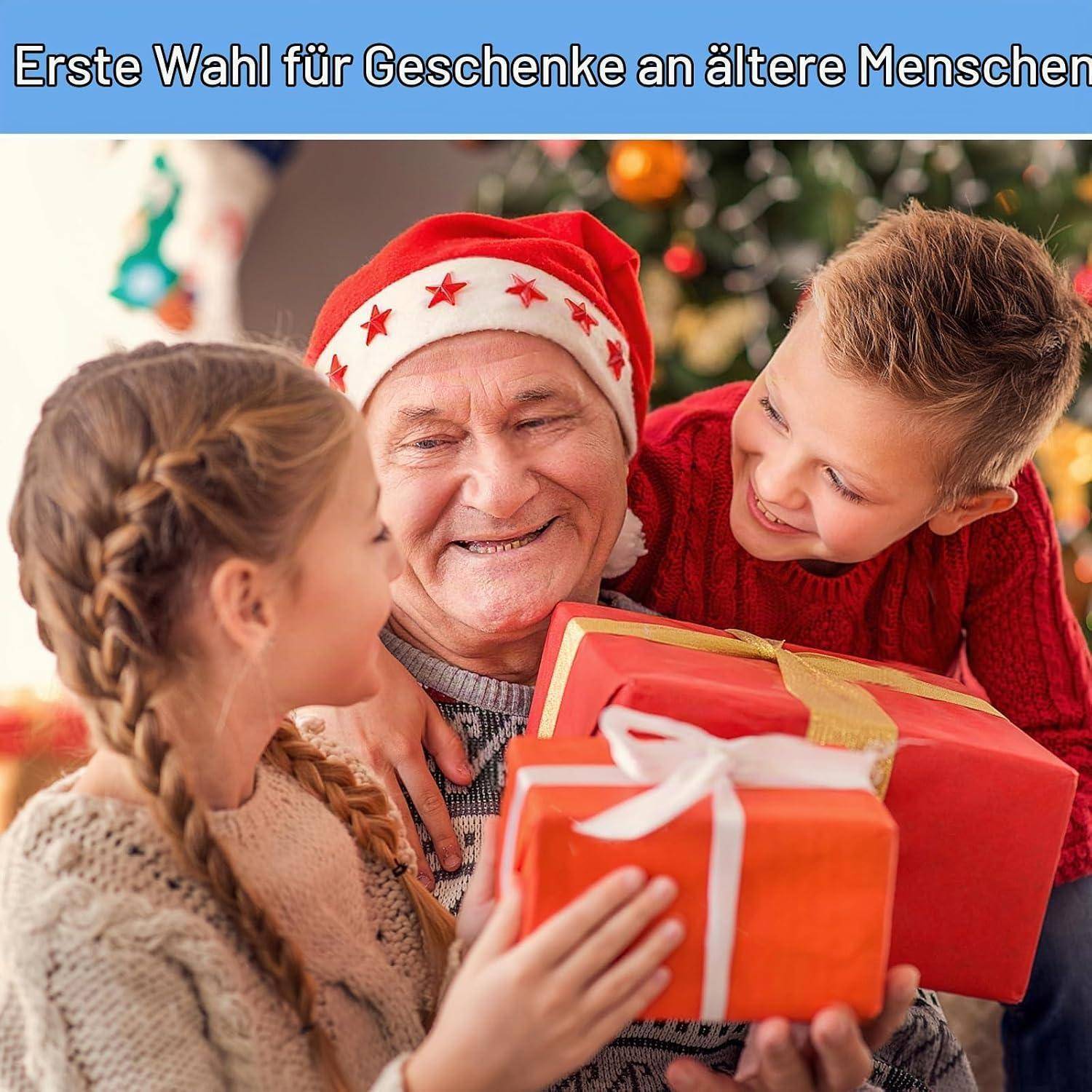 Großmutter in Weihnachtsmütze lächelnd, während zwei Kinder eingewickelte Weihnachtsgeschenke präsentieren, mit deutscher Überschrift „Erste Wahl für Geschenke an ältere Menschen