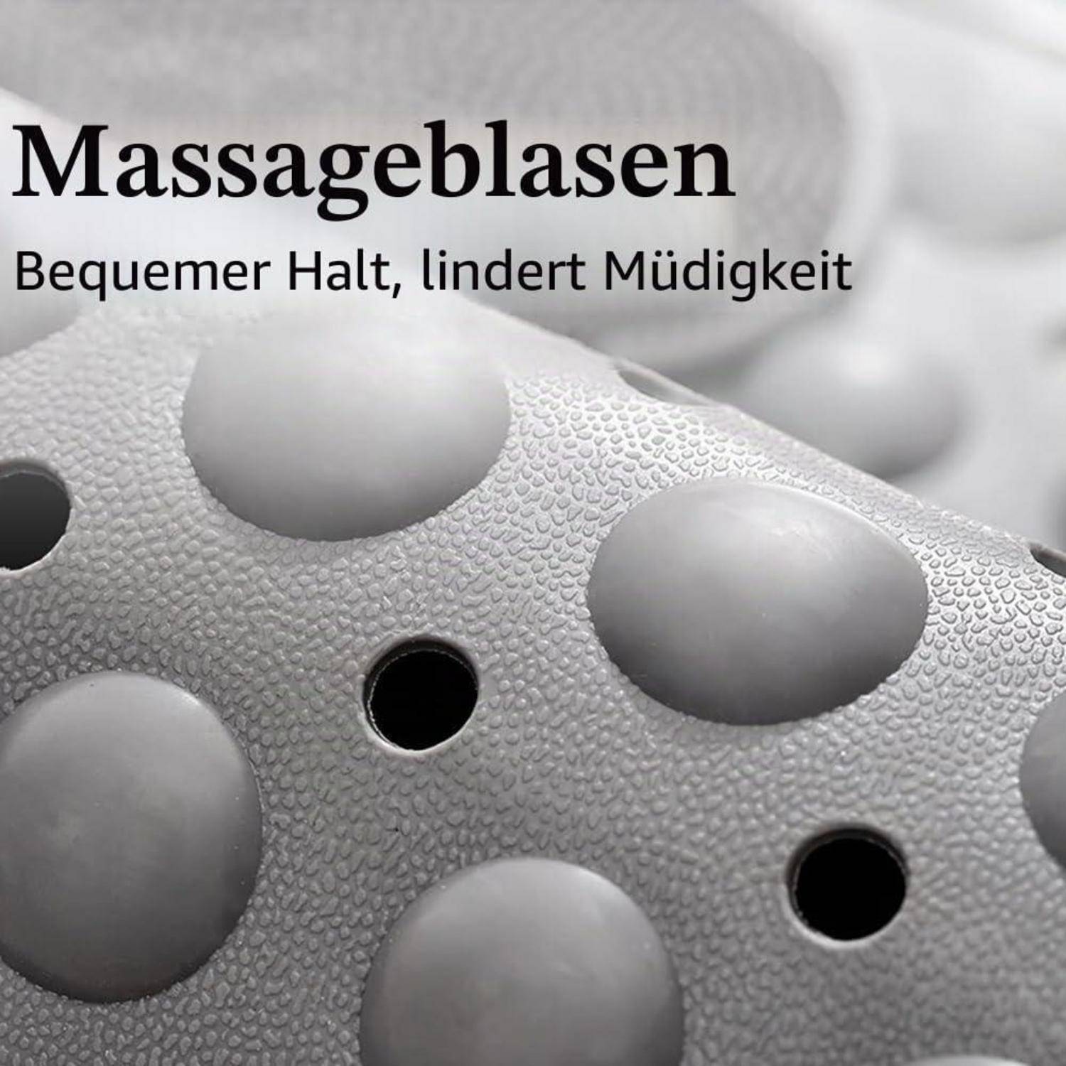 Nahaufnahme eines strukturierten Massageballs mit erhabenen Noppen und Löchern, beschriftet mit „Massageblasen