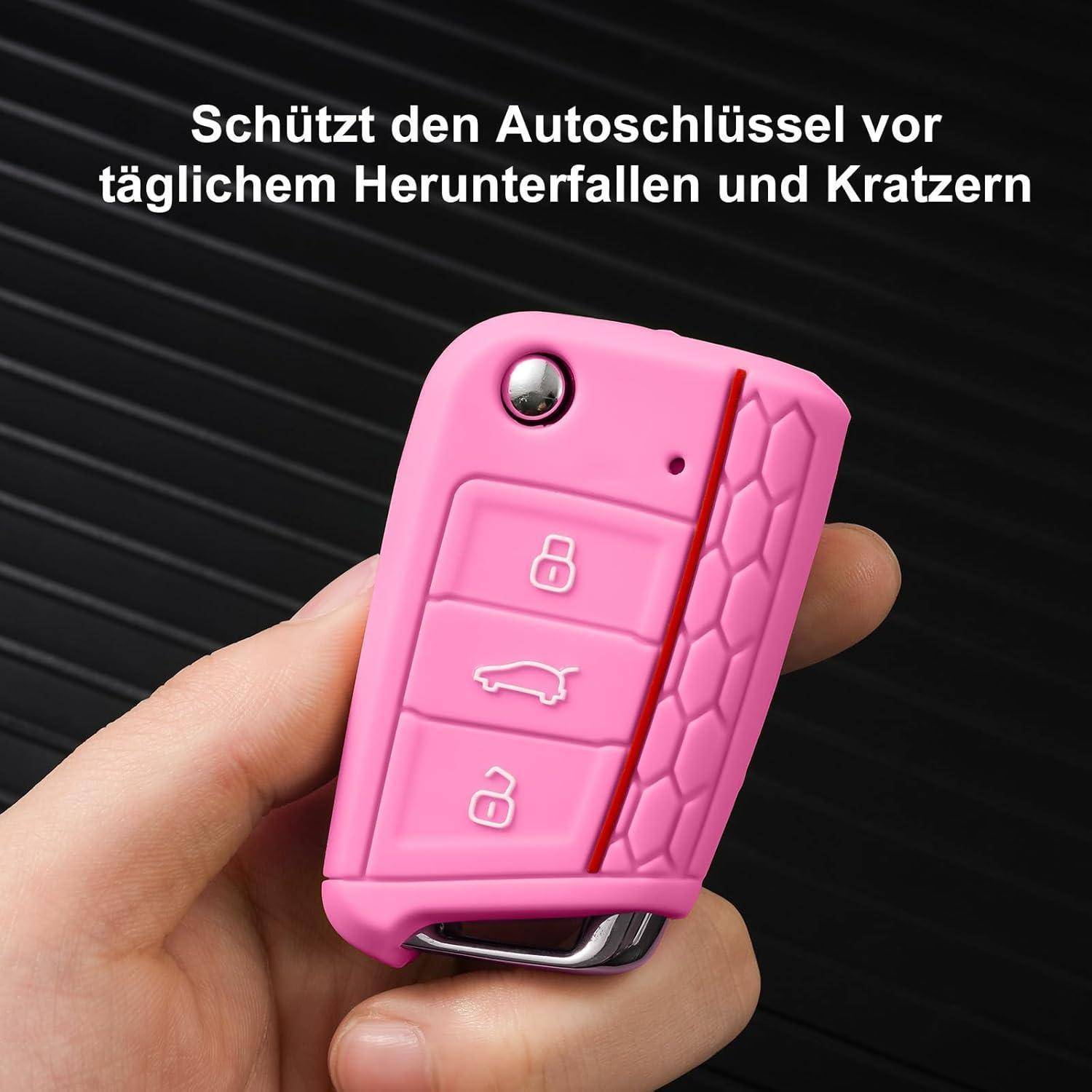 Rosa Silikon-Autoschlüsselhülle in einer Hand, mit deutschem Text, der besagt, dass sie den Autoschlüssel vor Stürzen und Kratzern schützt.