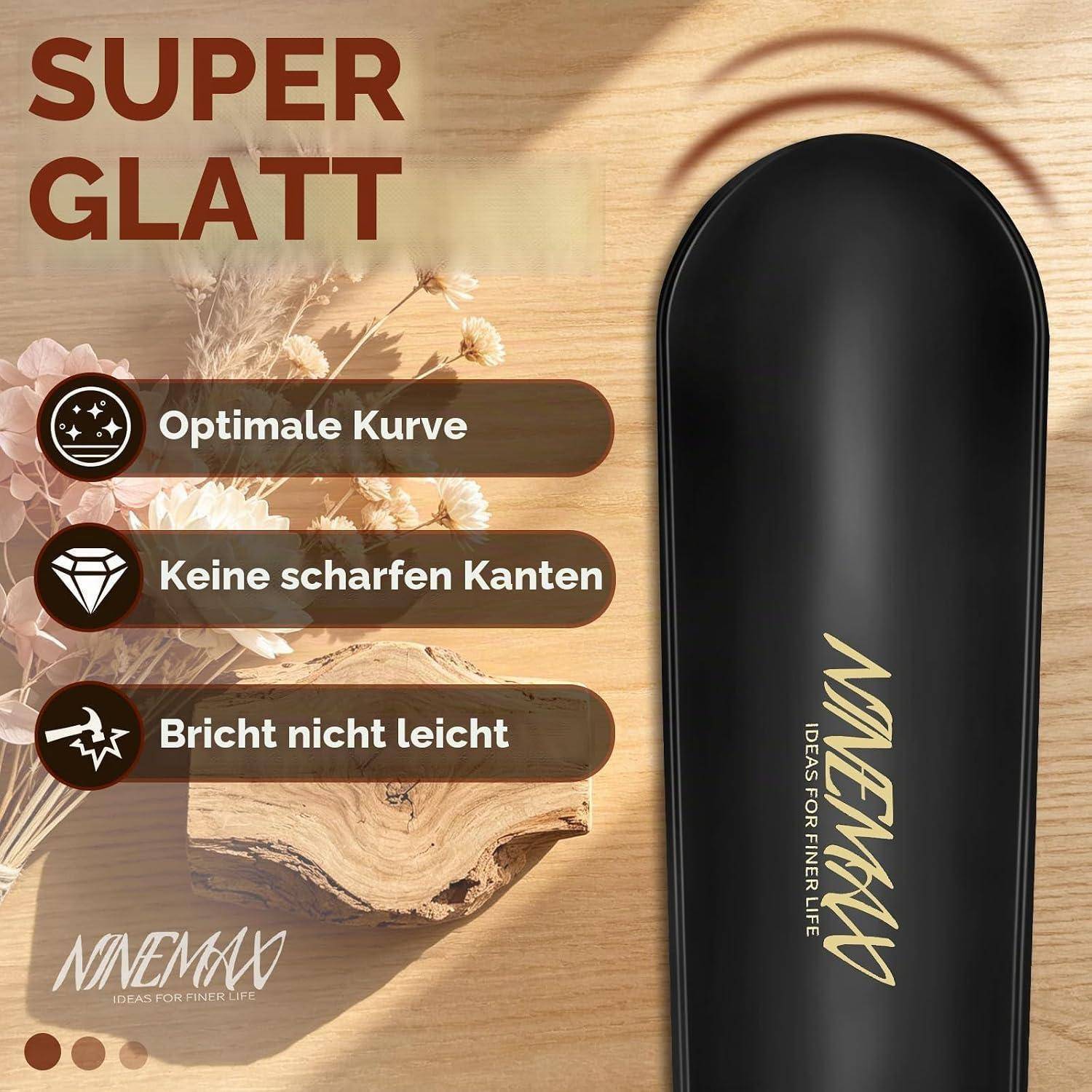 Schwarzes Skateboard-Deck auf Holzhintergrund mit deutschem Text, der 