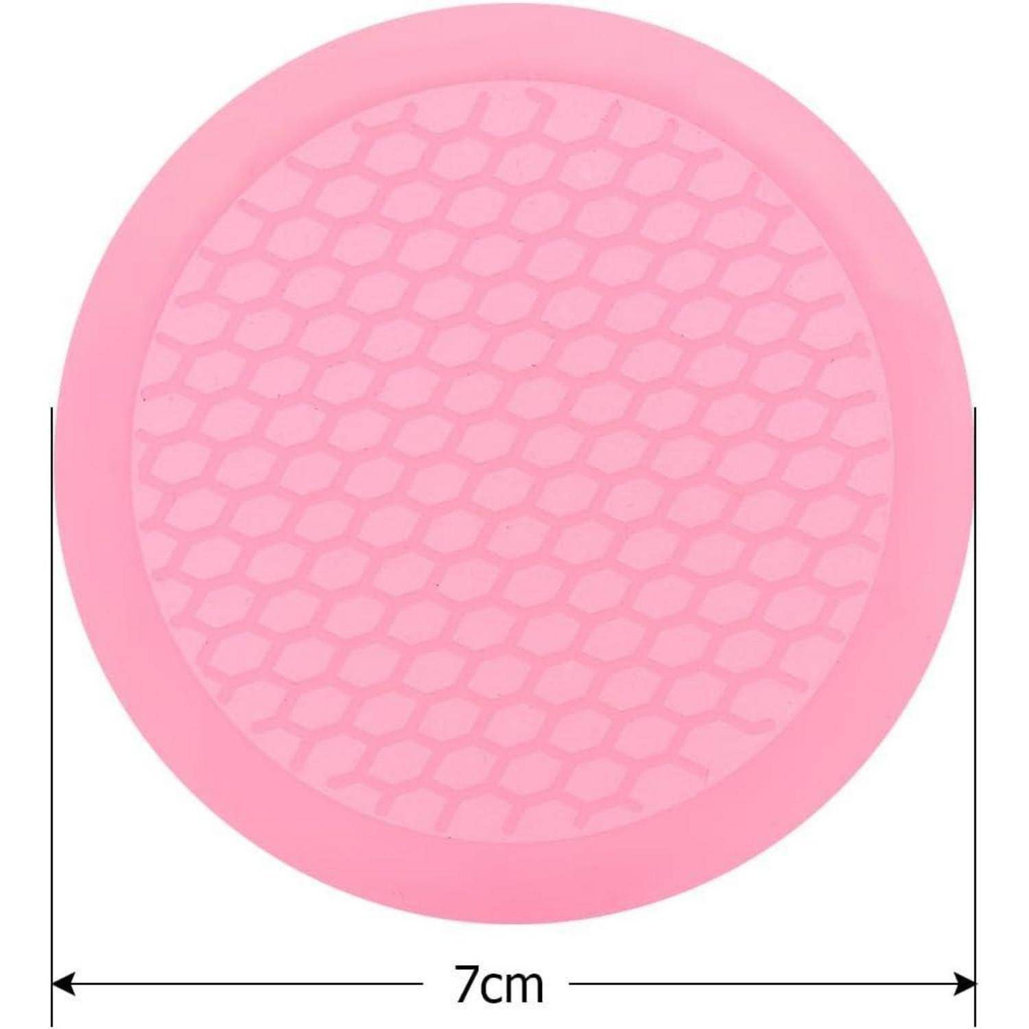 Rosa rundes Silikonmatte mit Wabentextur, gezeigt mit einer Durchmessermessung von 7 cm.