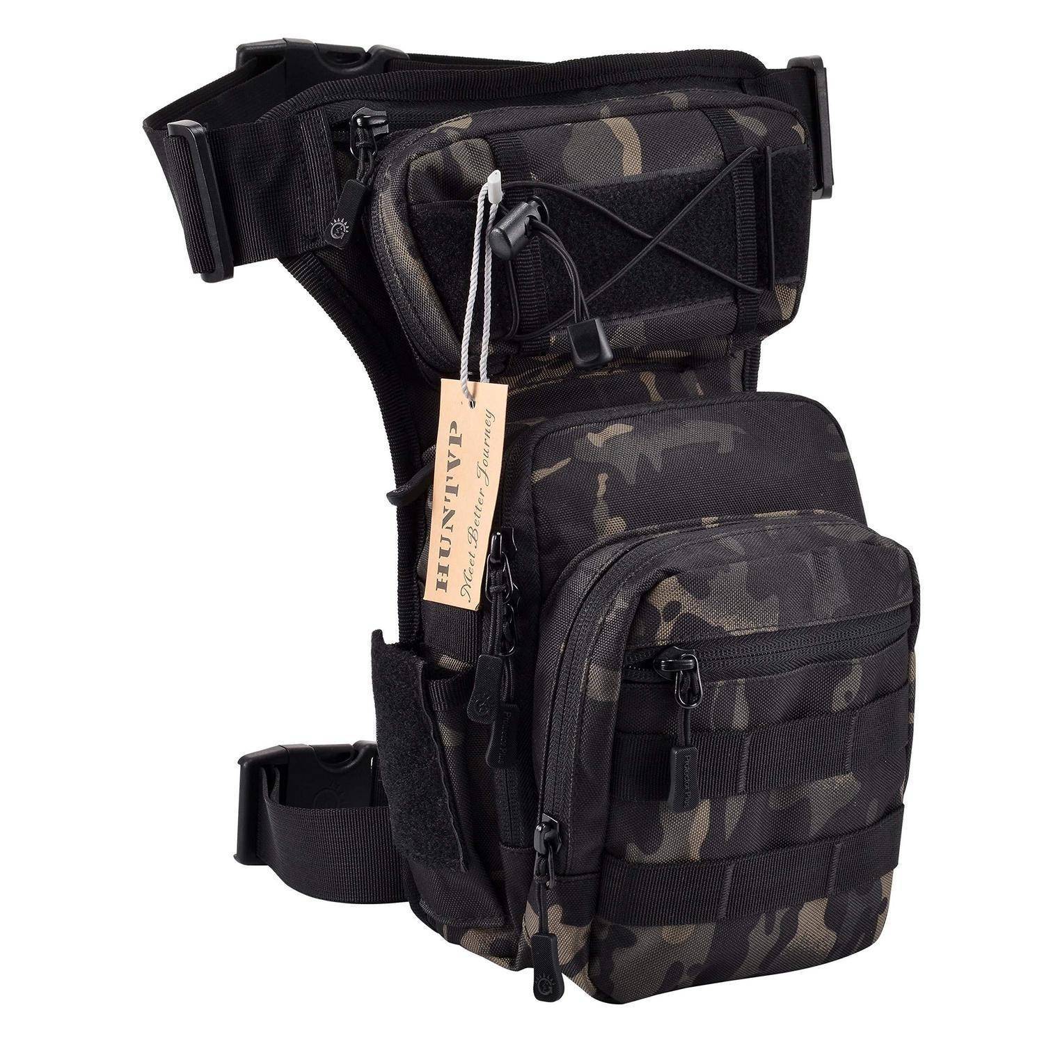 Schwarze Tarntaktische Oberschenkeltasche mit mehreren Reißverschlusstaschen und verstellbaren Hüft- und Beingurten, auf weißem Hintergrund dargestellt.