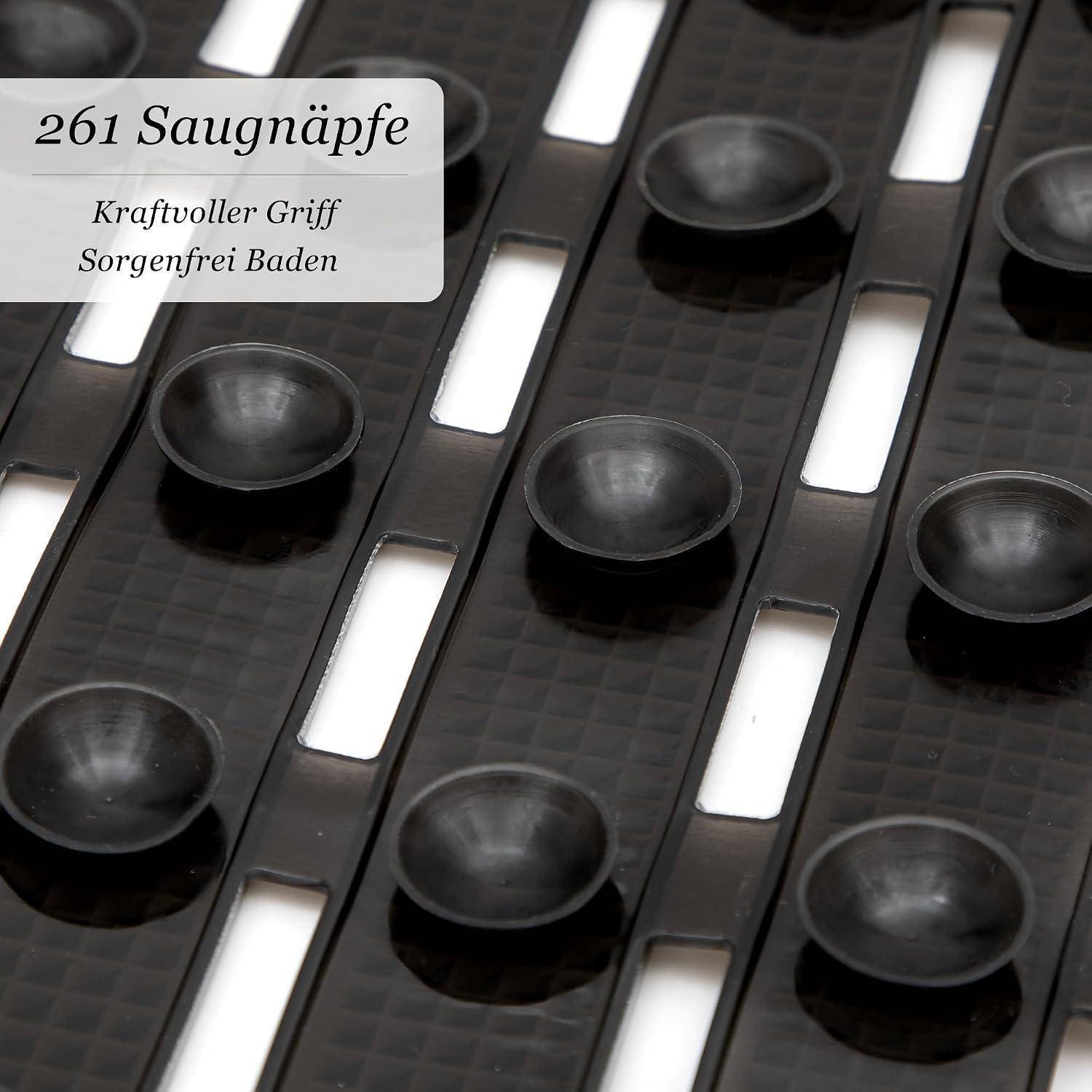 Schwarze Saugnäpfe auf einer strukturierten Matte mit weißen Schlitzen; überlagerte deutsche Texte lesen 
