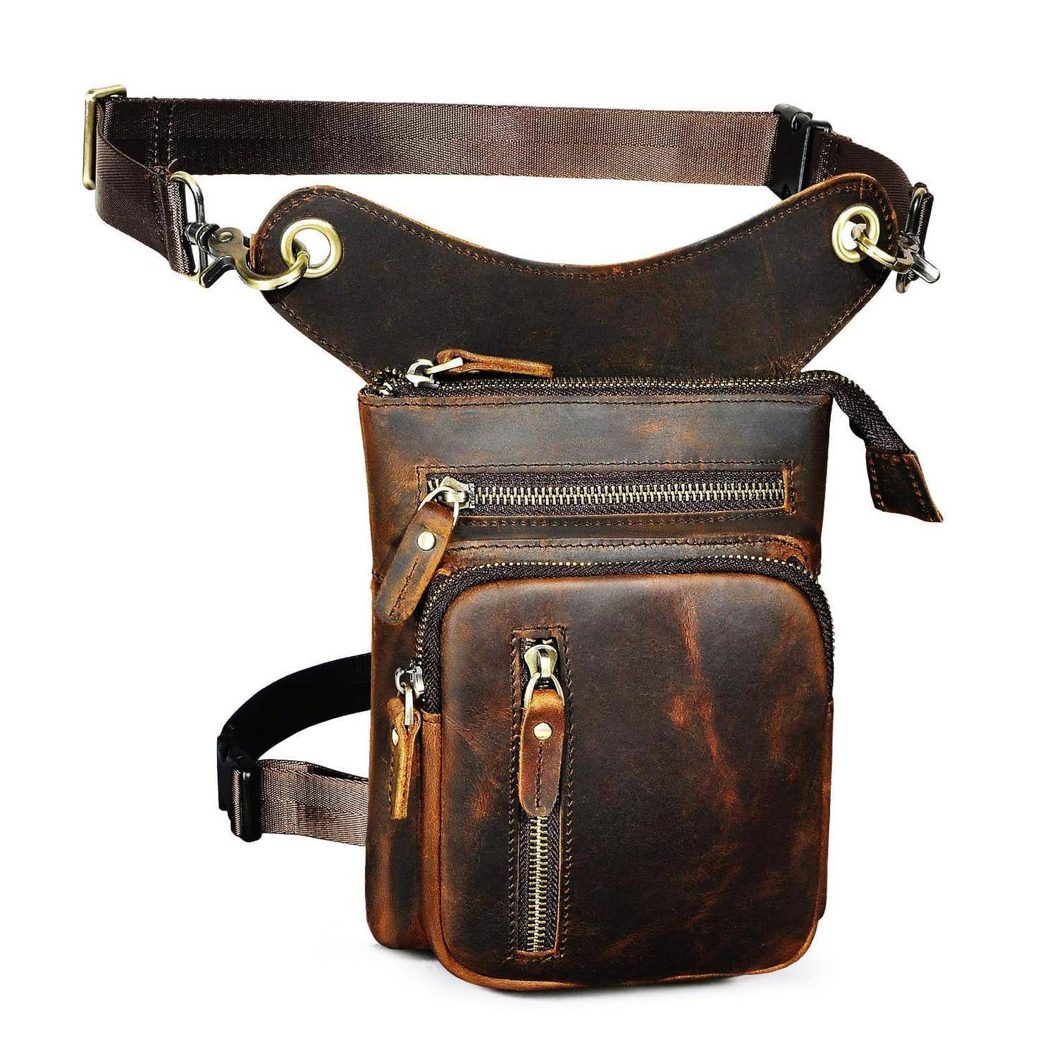 Braune Lederhüfttasche mit verstellbaren Hüft- und Beingurten, mehreren Reißverschlusstaschen und einem abgenutzten Vintage-Look.