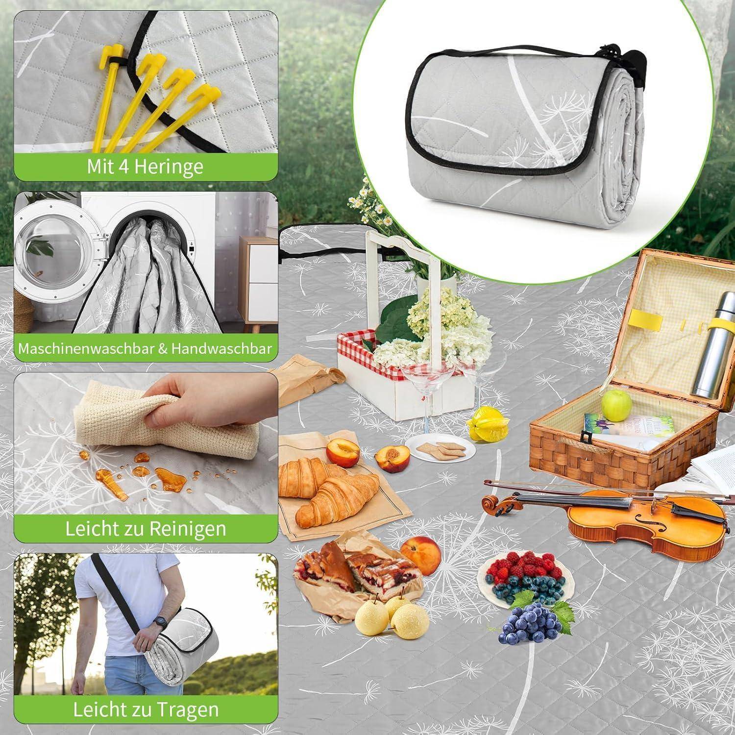 Graue isolierte Picknicktasche mit Schultergurt und 4 Heringen, gezeigt mit Lebensmitteln, Wein und Violine bei einem Picknick im Freien; Einsatzfelder heben die waschbaren, leicht zu reinigenden und leicht zu tragenden Funktionen hervor.