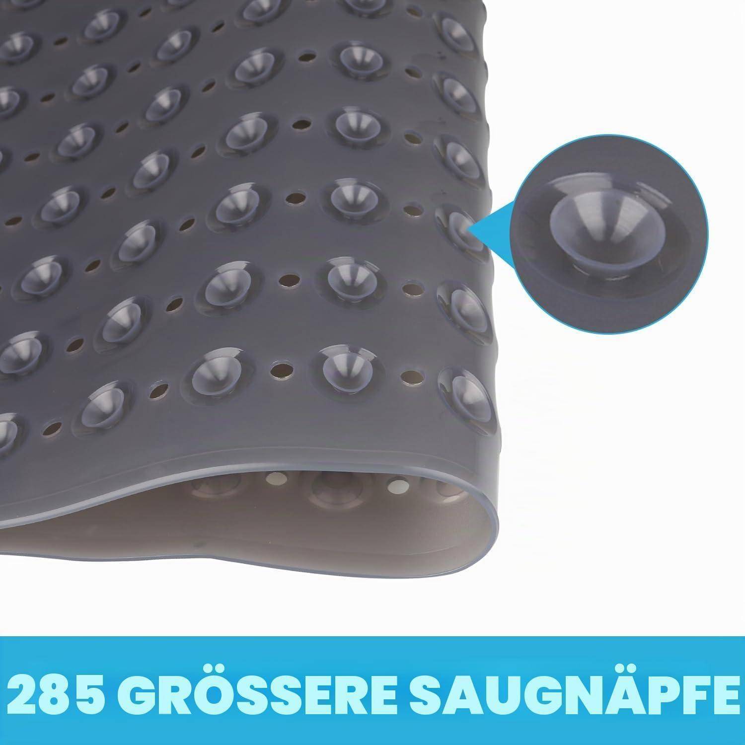 Nahaufnahme einer grauen Saugmatte mit vielen gerundeten Saugnäpfen; Vergrößerung zeigt einen Napf. Der Text lautet „285 GRÖSSERE SAUGNÄPFE