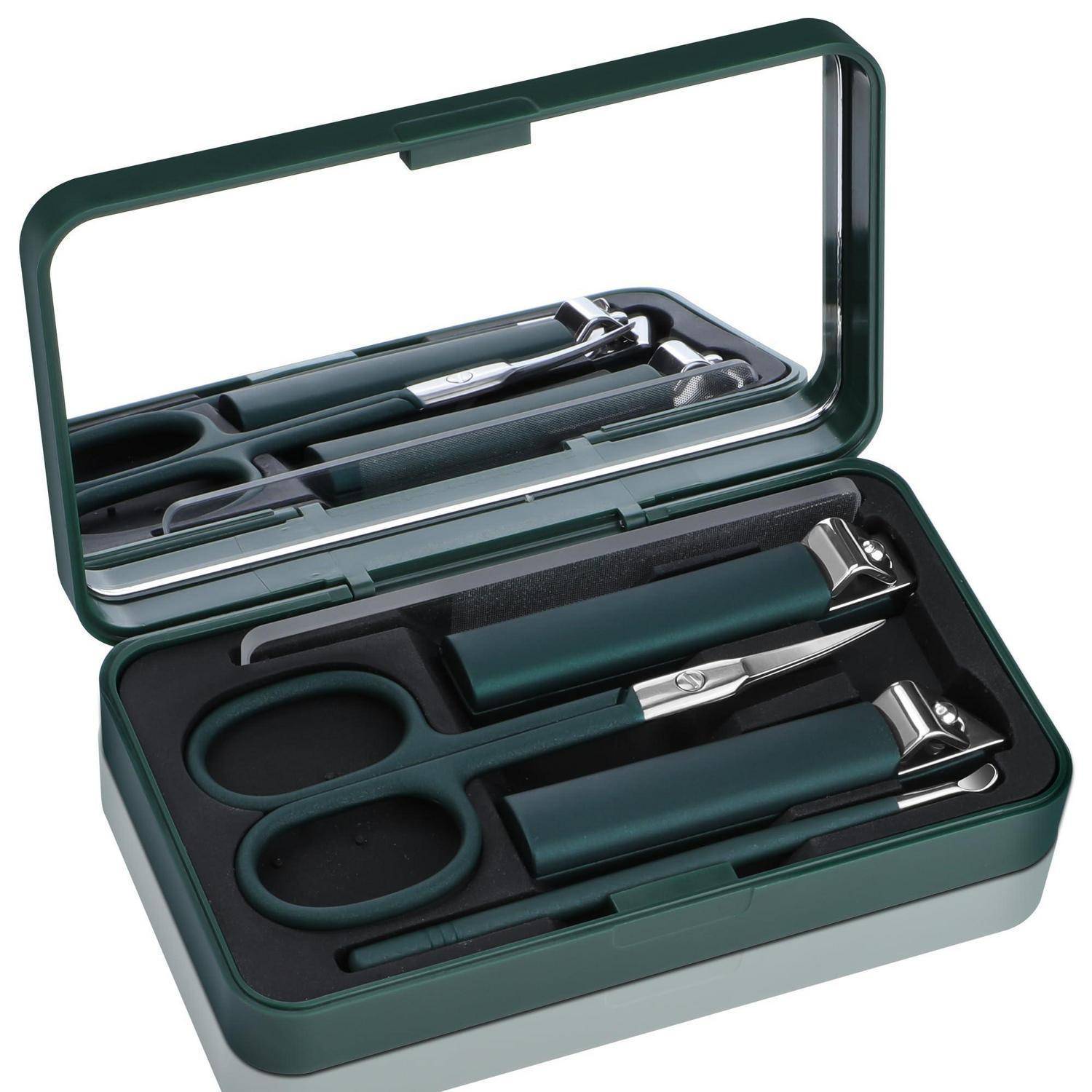Grünes Maniküre-Set in einem Etui mit Scharnier und Spiegel, enthaltend Schere, Nagelknipser, Pinzette und andere Pflegeinstrumente.