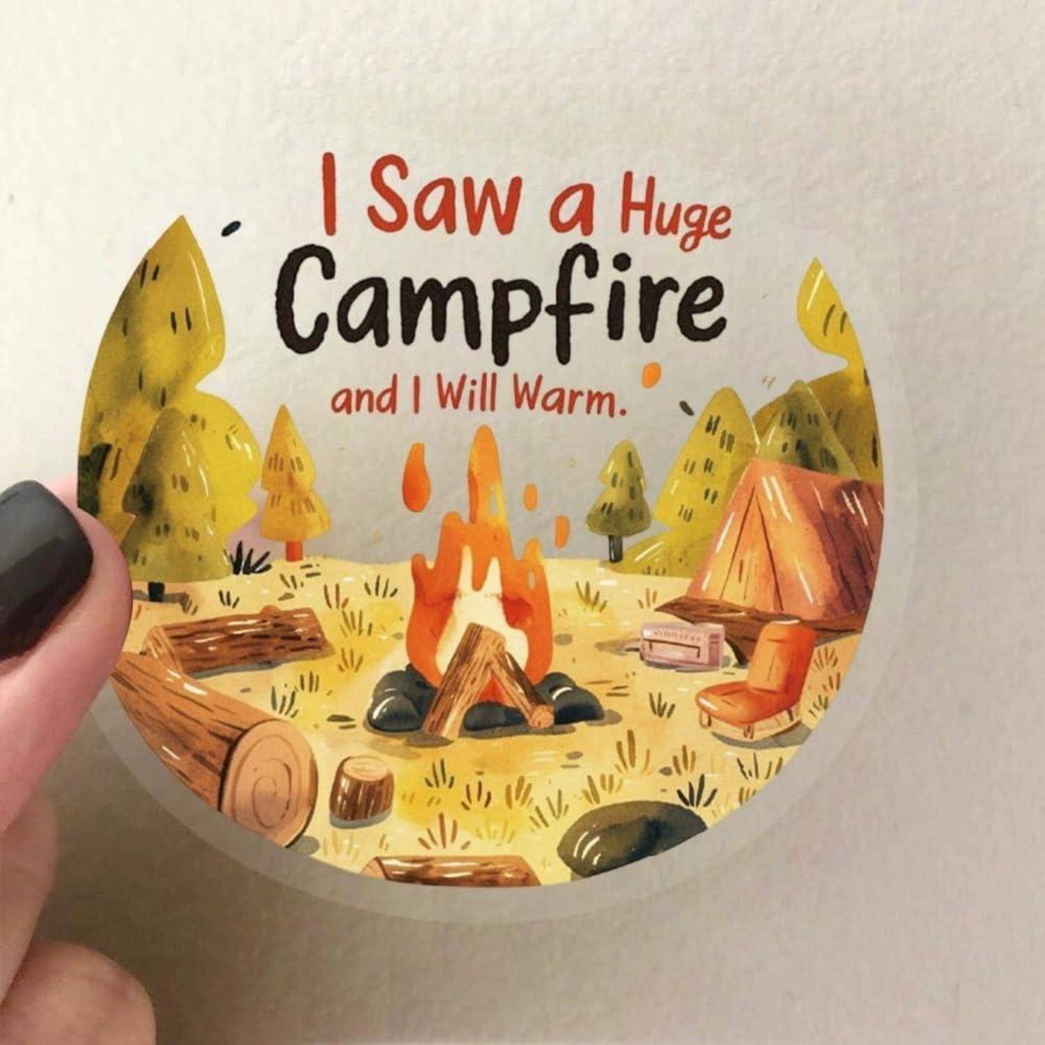 Illustrierte Campingplatzszene mit einem großen Lagerfeuer und Zelten, beschriftet mit „Ich habe ein riesiges Lagerfeuer gesehen und ich werde mich wärmen.