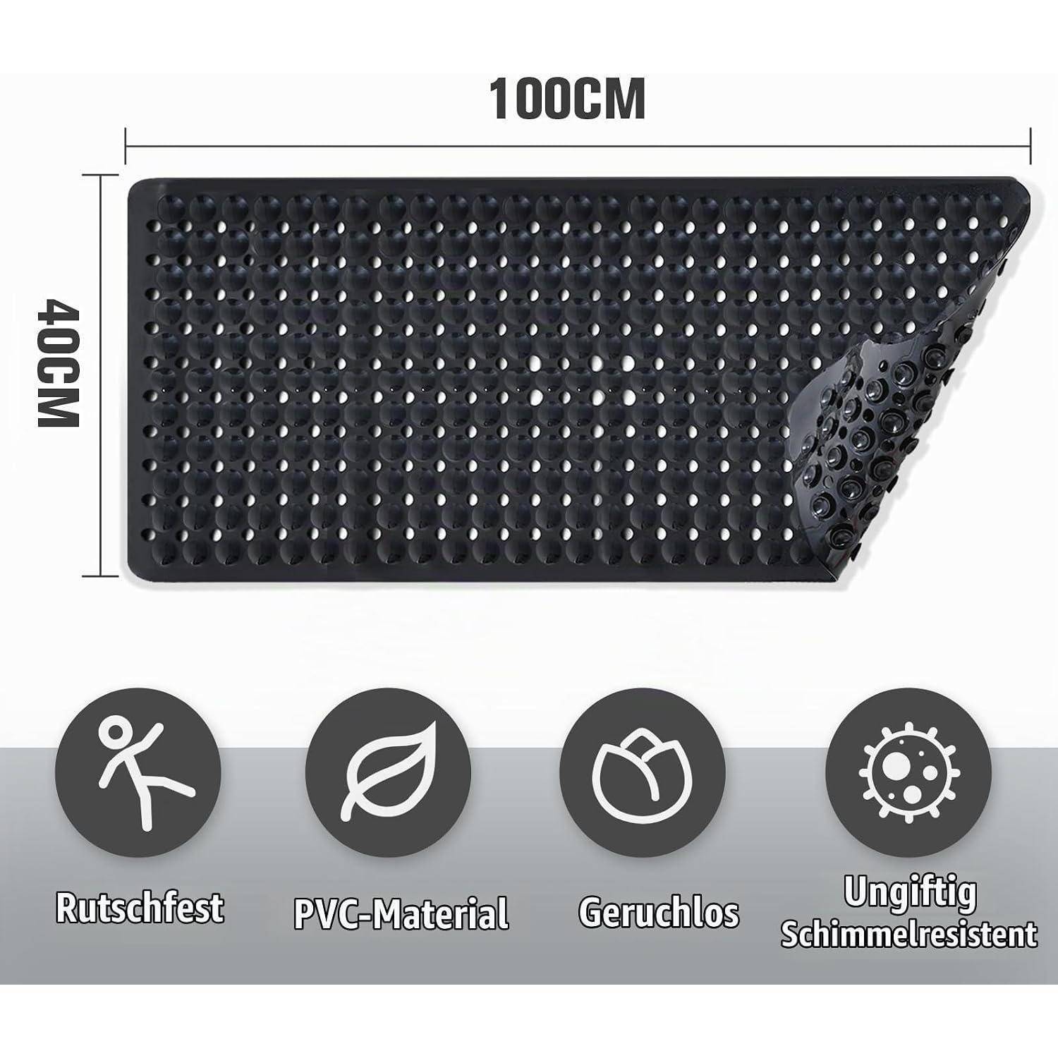 Schwarze Antirutschmatte mit den Maßen 100 cm mal 40 cm, mit einer abgelösten Ecke, die die strukturierte PVC-Rückseite zeigt; Symbole kennzeichnen Rutschhemmung, PVC-Material, geruchlos, ungiftig, schimmelresistent.