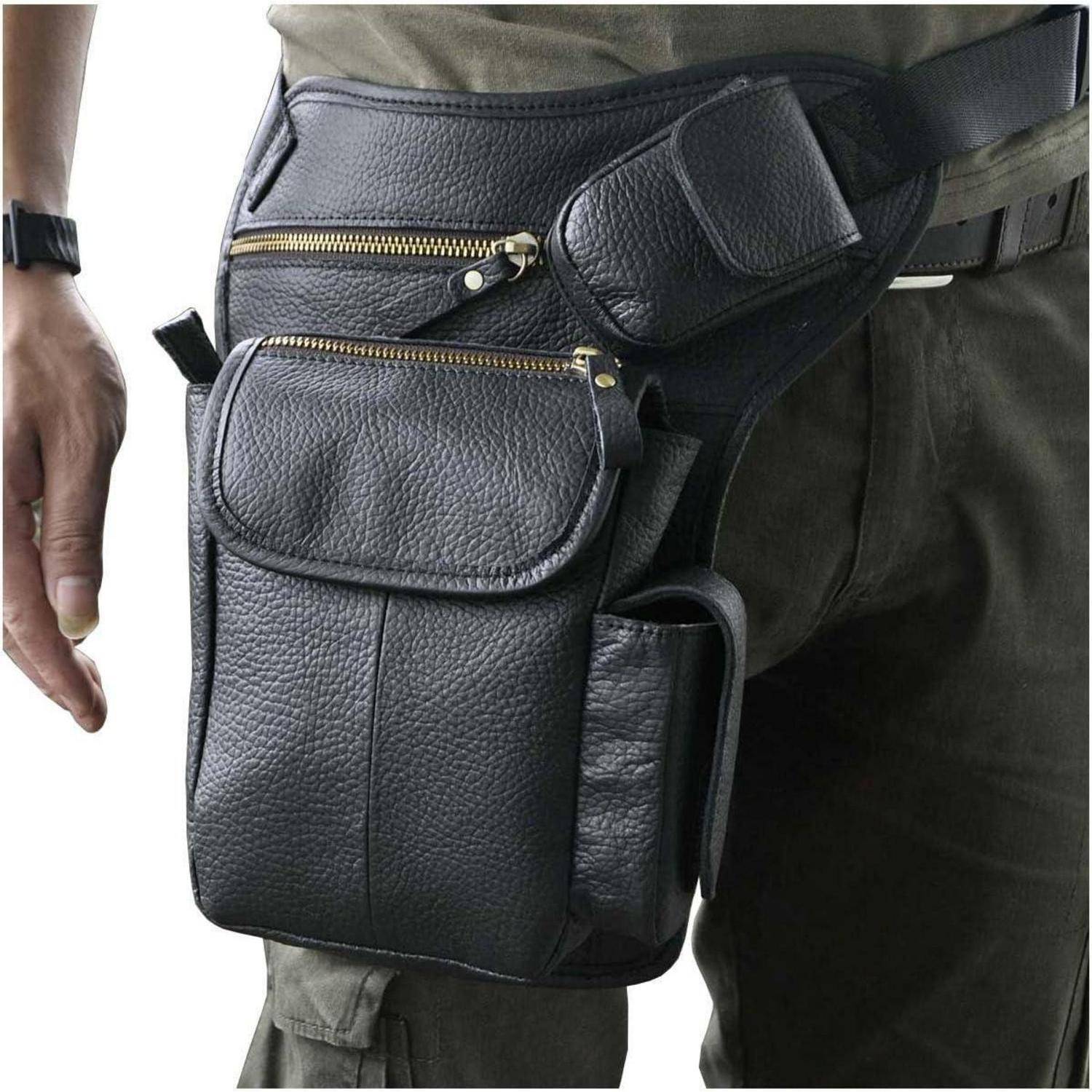 Nahaufnahme einer schwarzen Lederoberschenkel-Holster-Tasche, die um die Taille und das Bein einer Person geschnallt ist, mit Reißverschlusstaschen und Beuteln.