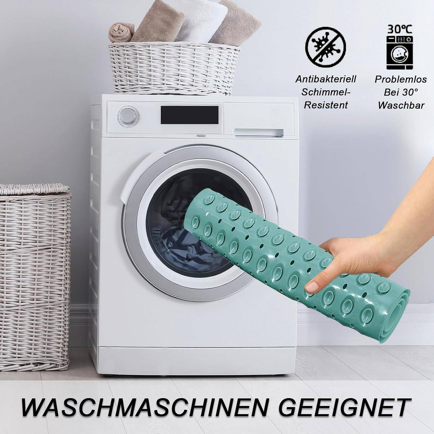 Produktbild zeigt eine grüne rutschfeste Matte, die in eine Frontladwaschmaschine eingeführt wird; der Text lautet „Waschmaschinen geeignet