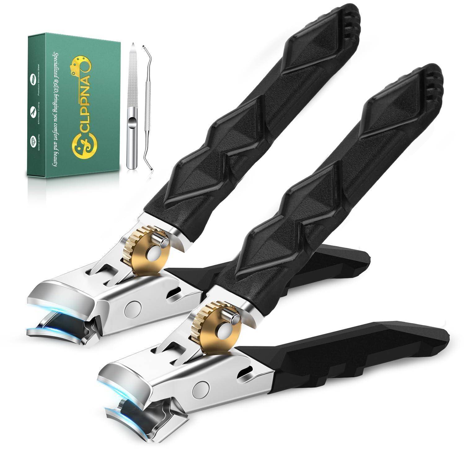 Zwei schwarze Nagelschere für Haustiere mit Sicherheitsvorrichtungen und eine kleine grüne Produktschachtel, dargestellt auf weißem Hintergrund.