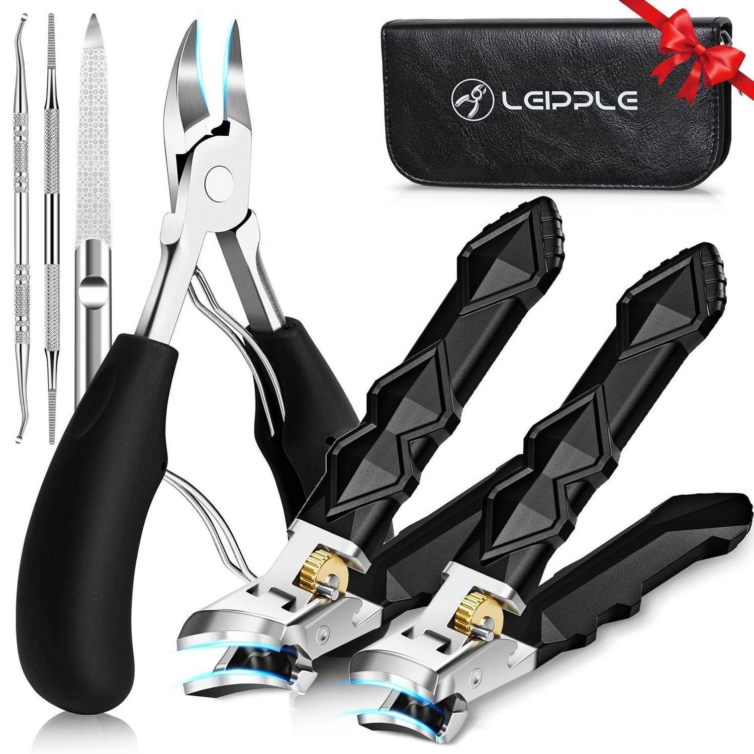 Satz mit professionellen Nagelknipsern und Pflegeutensilien, bestehend aus zwei großen schwarzen Knipsern, drei Metallwerkzeugen für Nagelhaut und einem schwarzen Reißverschlussetui mit der Aufschrift 'Lappul' und einer roten Schleife.