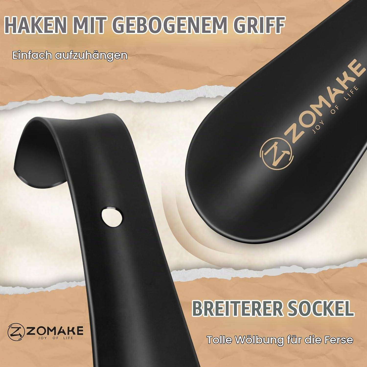 Produktbild eines schwarzen Zomake-Schuhanziehers mit gebogenem Griff und breiterem Sockel, gekennzeichnet mit den deutschen Bezeichnungen „Haken mit gebogenem Griff