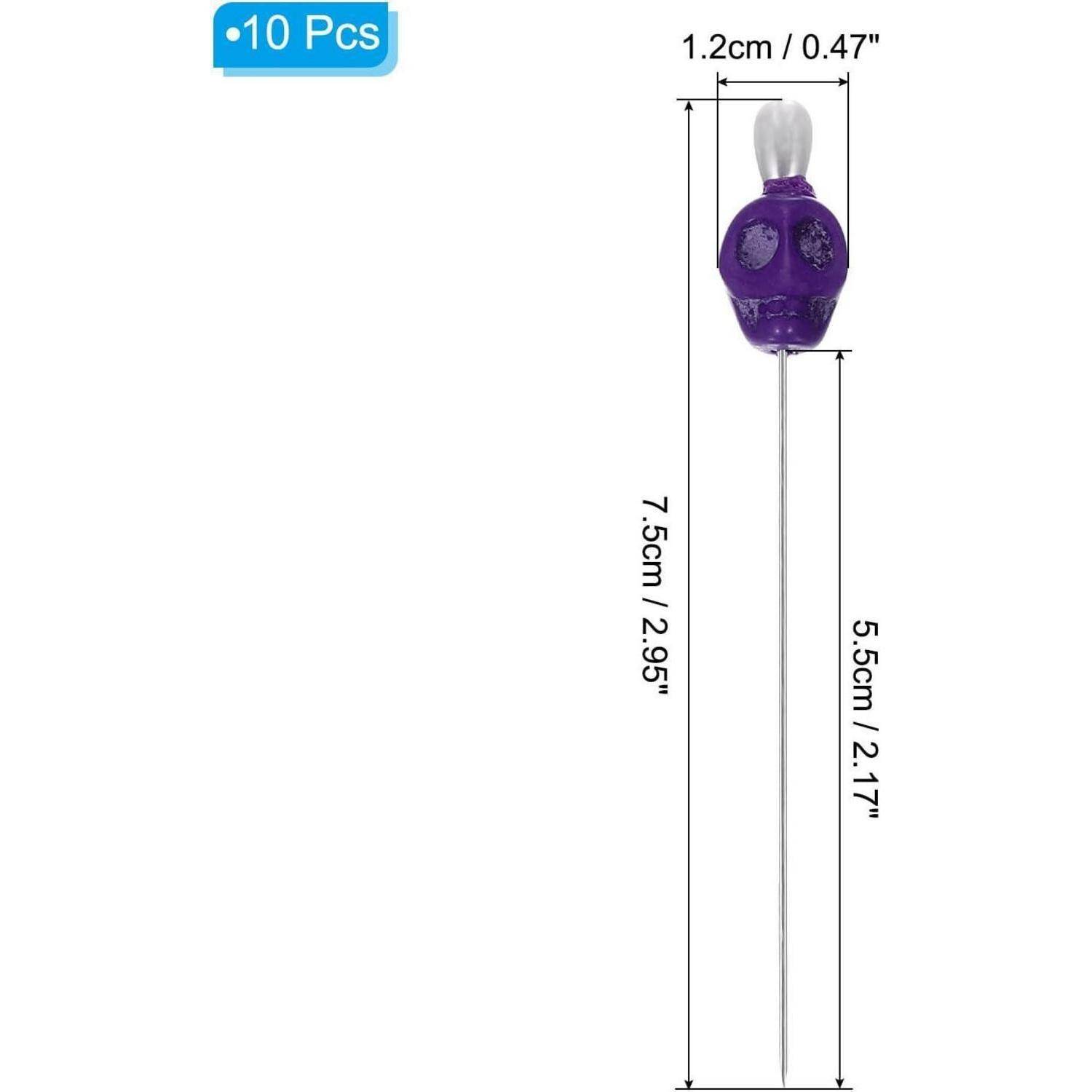 Packung mit 10 violetten Stiften mit Totenkopfaufsatz, zeigt eine Länge von 7,5 cm und eine Breite von 1,2 cm mit Messbeschriftungen.