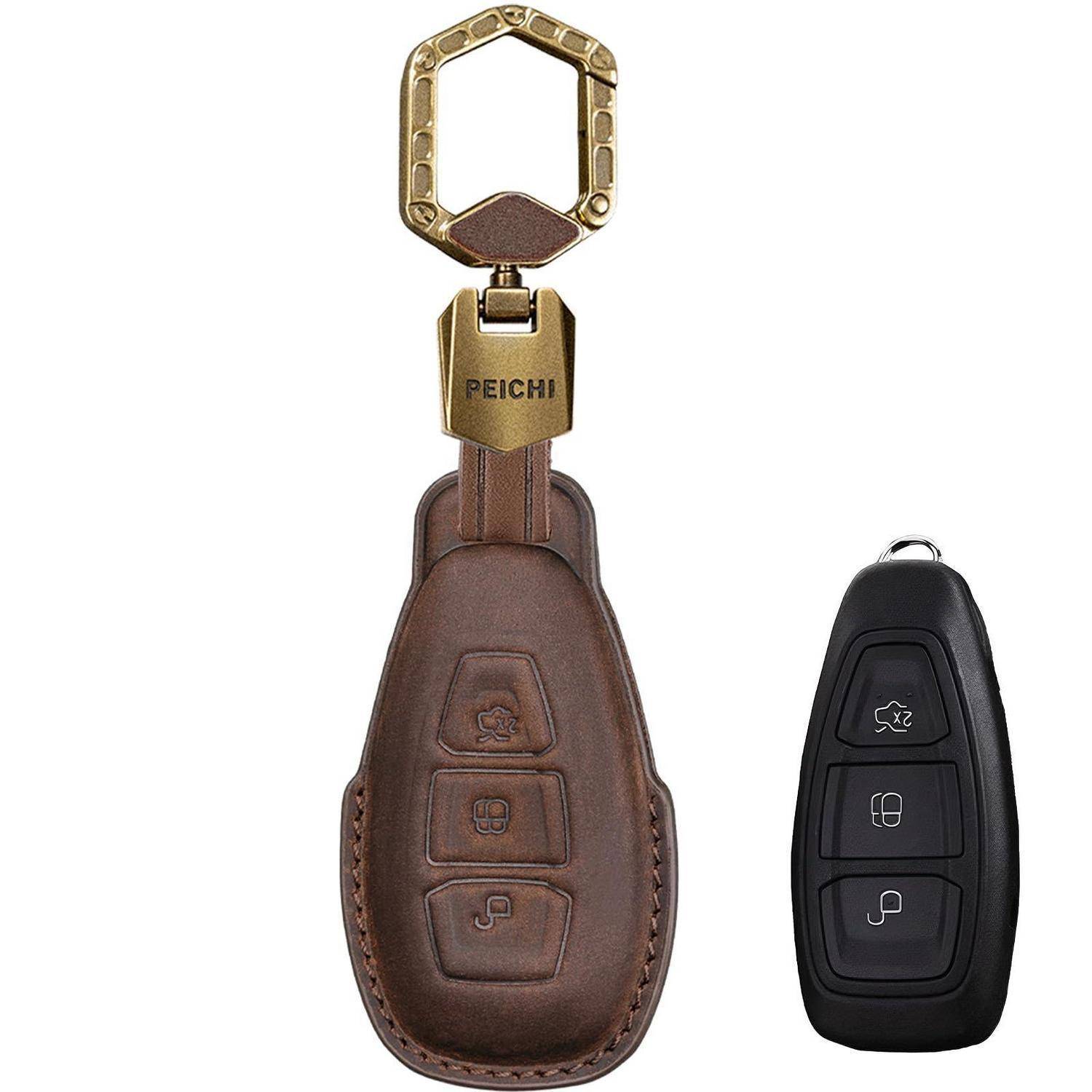 Schutzhülle aus braunem Leder für Schlüsselanhänger mit Goldclip neben einer schwarzen Autoschlüssel-Fernbedienung, die einen Schutzkoffer für einen intelligenten Schlüssel zeigt.