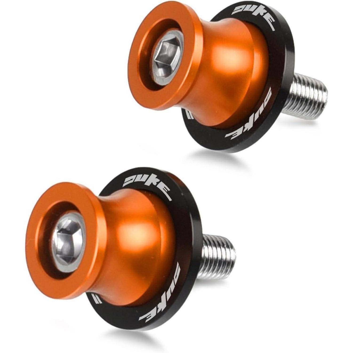 Zwei orange-schwarze Sturzpads oder Achsenschieber für Motorräder mit Gewinde­bolzen, gezeigt auf weißem Hintergrund.