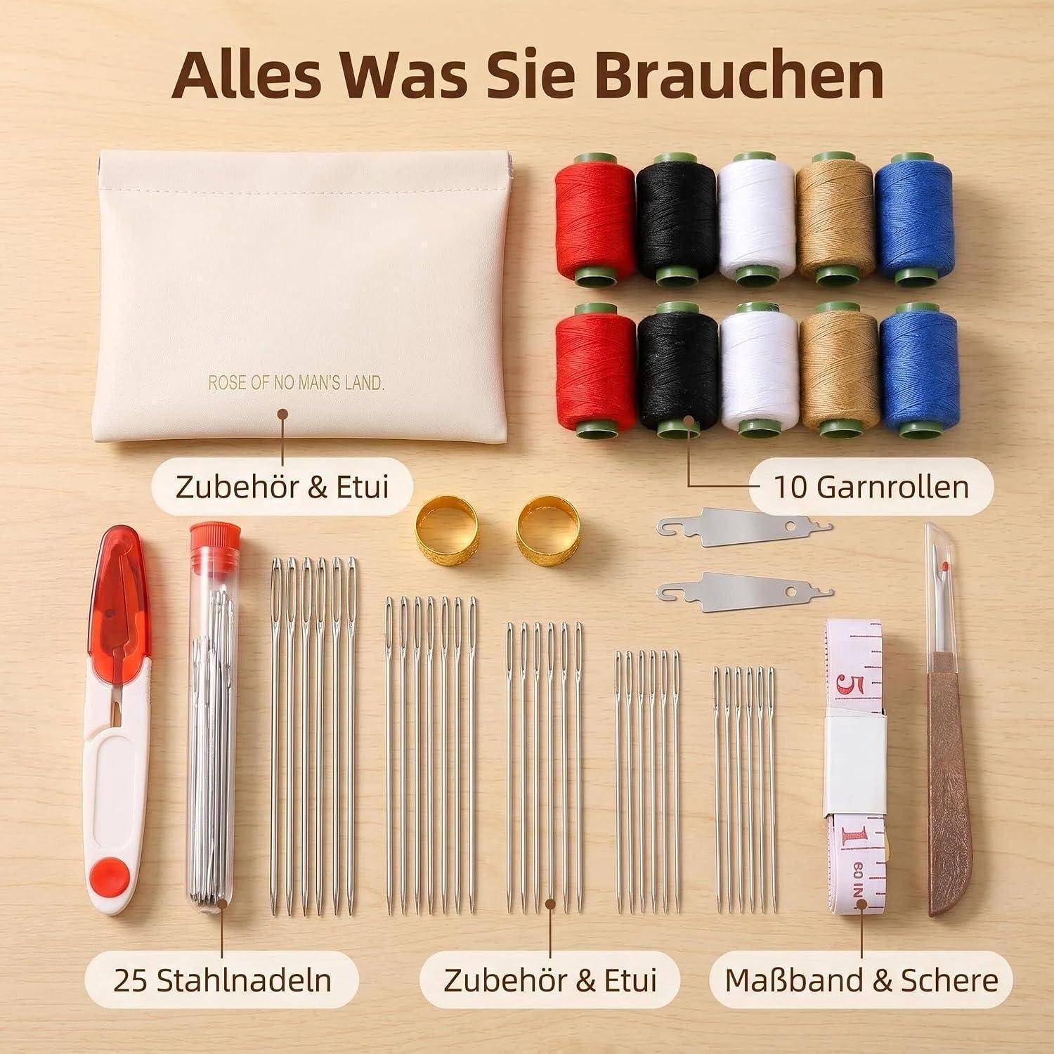 Nähset auf einem Tisch ausgebreitet, beschriftet auf Deutsch mit 25 Stahlnadeln, 10 Fadenspulen, Zubehör und Etui, Maßstab und Schere.
