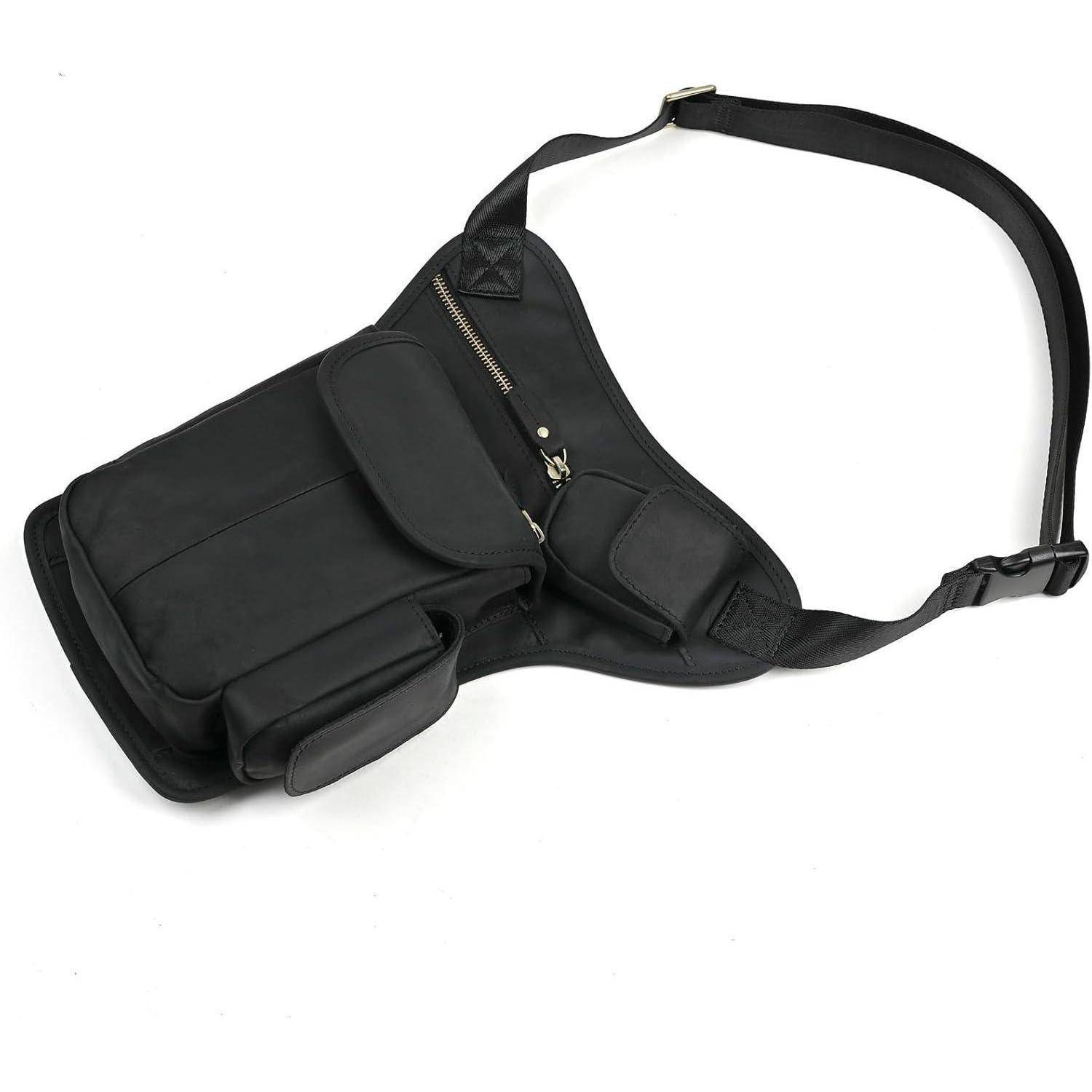 Schwarze Schultertasche mit mehreren Reißverschluss- und gepolsterten Fächern, auf weißem Hintergrund dargestellt.
