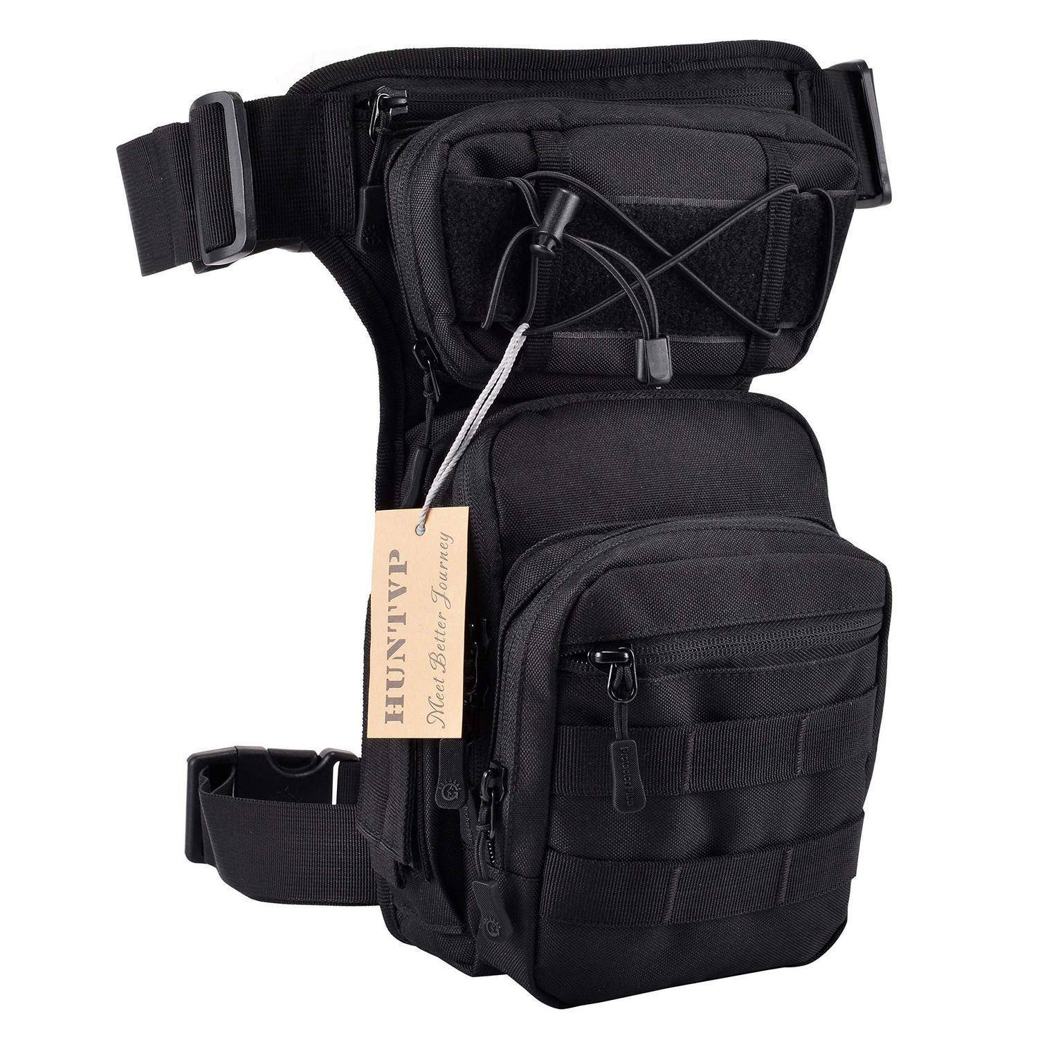 Schwarze taktische Oberschenkel-Utilitytasche mit verstellbaren Hüft- und Oberschenkelriemen, mehreren Reißverschlusstaschen und einem angehängten HUNTVP-Etikett auf weißem Hintergrund.