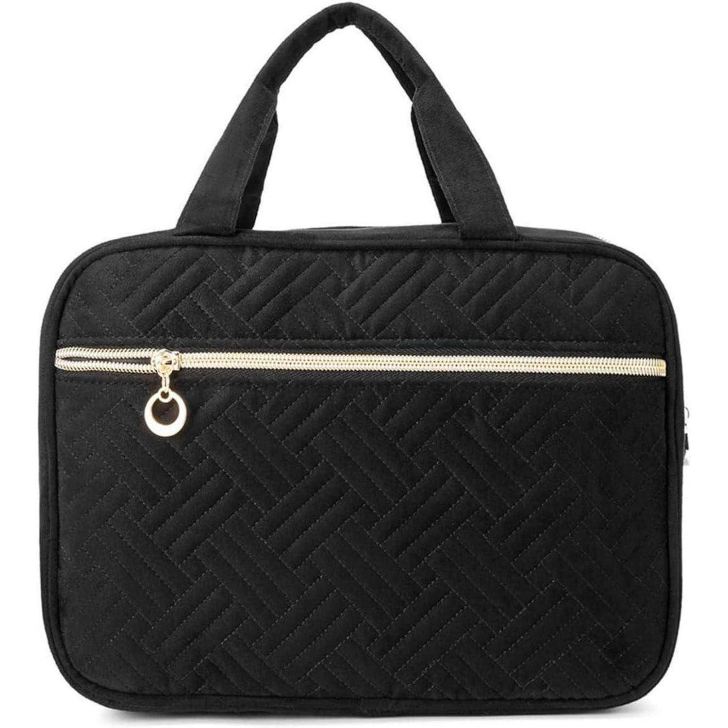 Schwarze gesteppte Handtasche mit Reißverschluss, zwei Henkeln und einer Reißverschlusstasche an der Vorderseite.