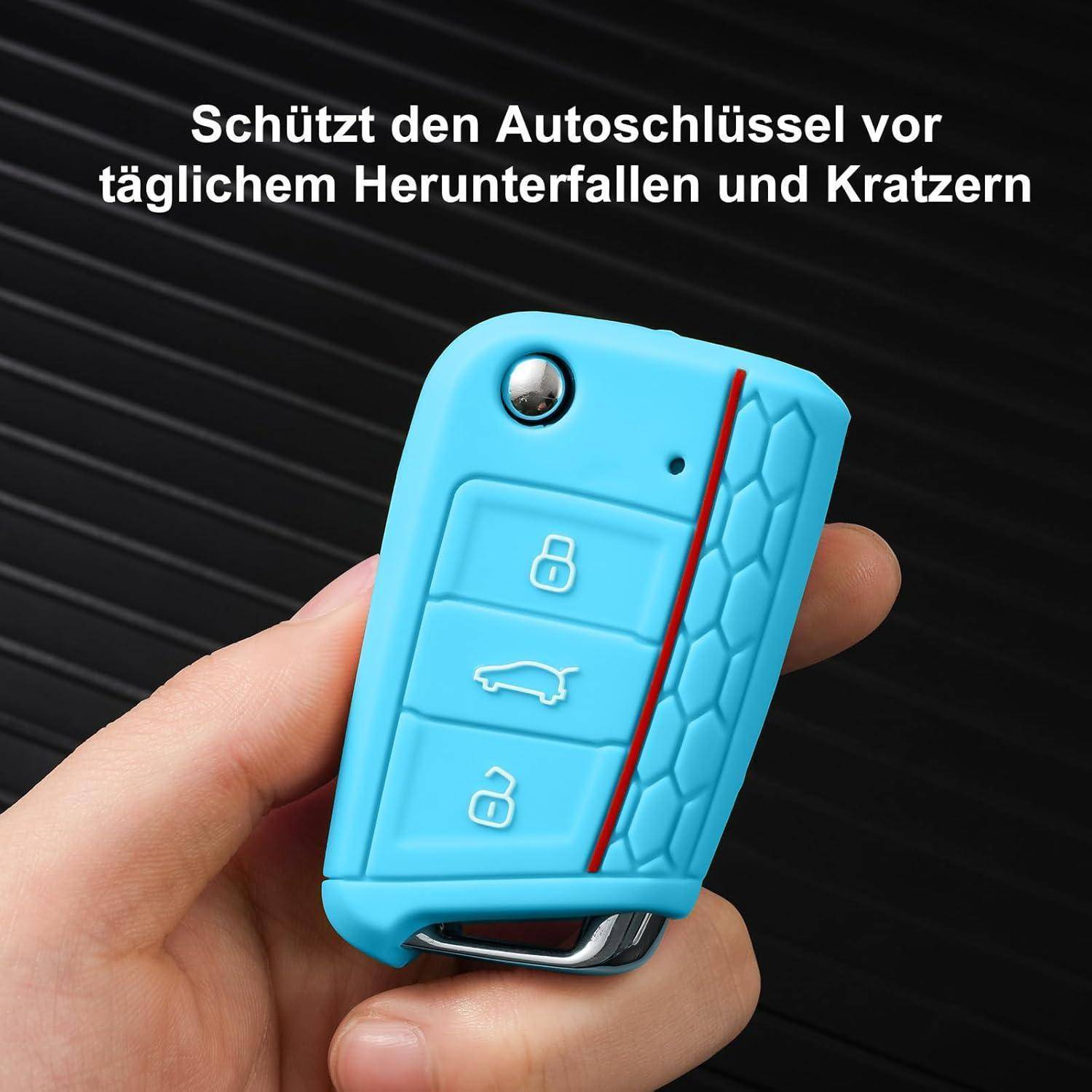 Hand hält eine blaue Autoschlüssel-Abdeckung mit Schloss- und Kofferraum-Tasten; deutscher Text besagt, dass sie den Autoschlüssel vor Stürzen und Kratzern schützt.