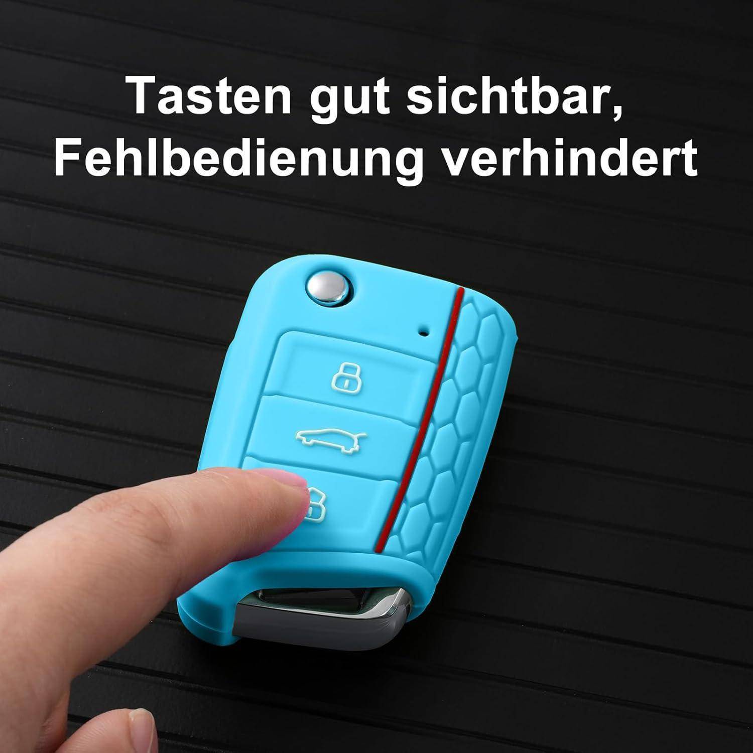 Ein Finger drückt auf einen blauen Autoschlüssel mit Schloss-, Kofferraum- und Autotasten; der deutsche Text besagt „Tasten gut sichtbar, Fehlbedienung verhindert