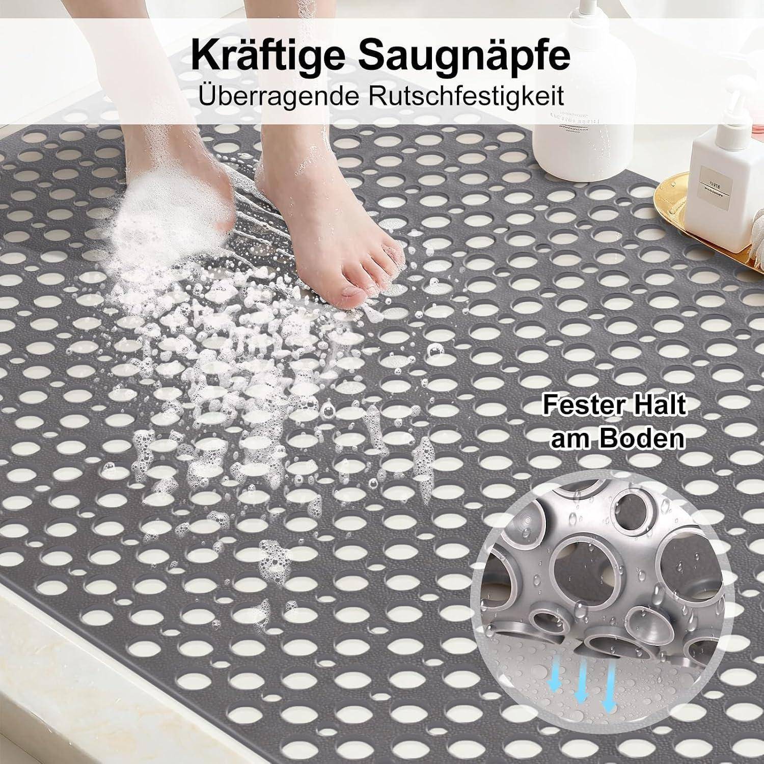 Person, die auf eine Saugbadematte tritt, mit deutschem Text „Kräftige Saugnäpfe