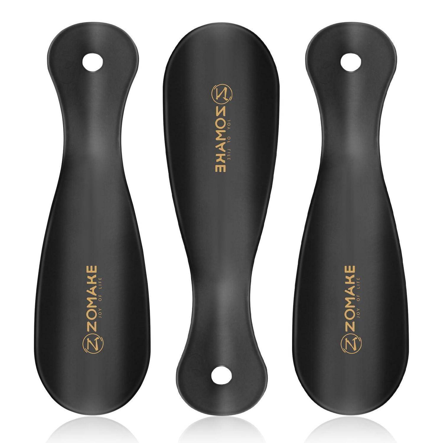 Drei schwarze ovale Griffplatten von Zomake mit jeweils einem Loch an den Enden, gezeigt auf weißem Hintergrund.