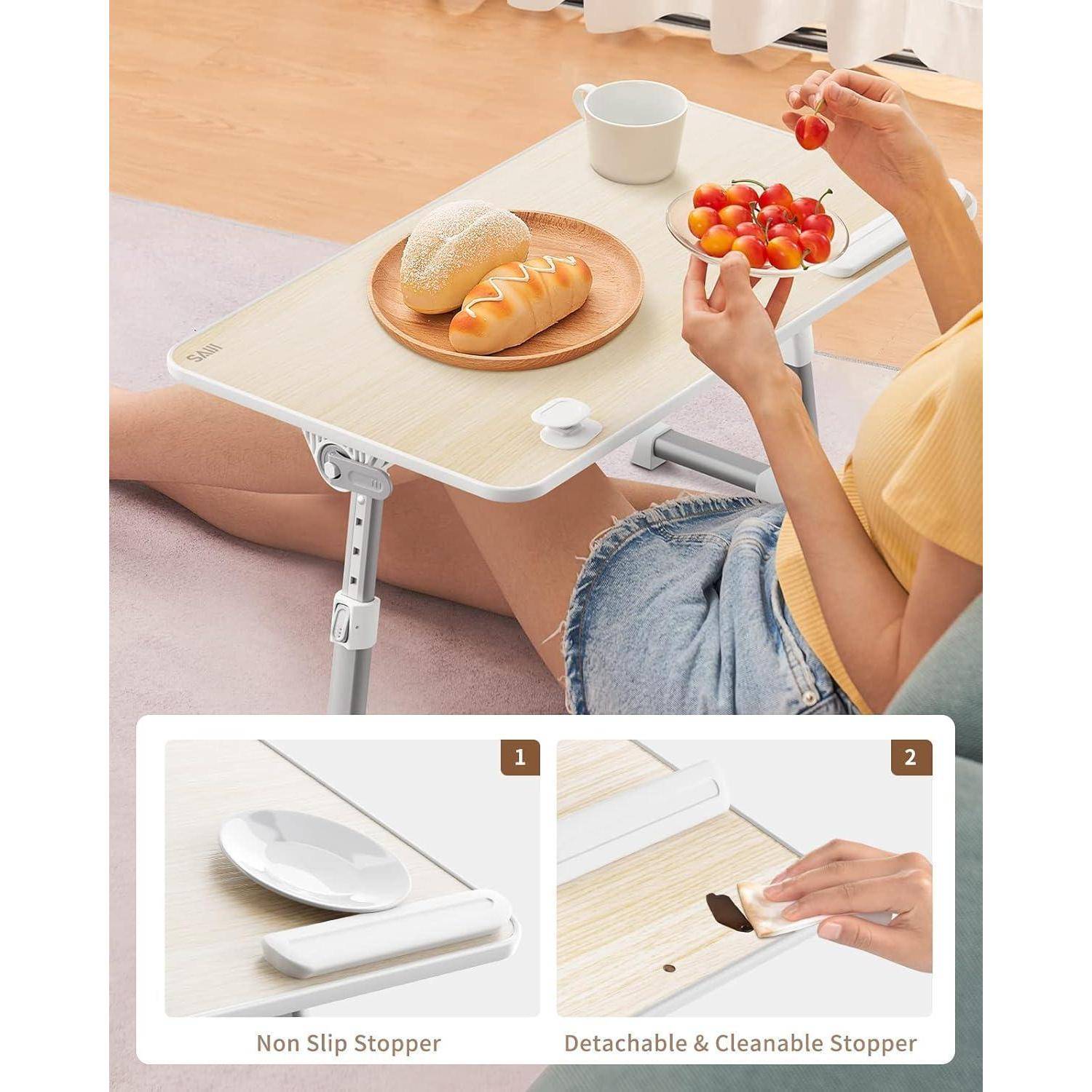 Verstellbarer Nachttisch mit Frühstückstablett; die Vergrößerung zeigt Details der rutschfesten, abnehmbaren und reinigbaren Stopper.