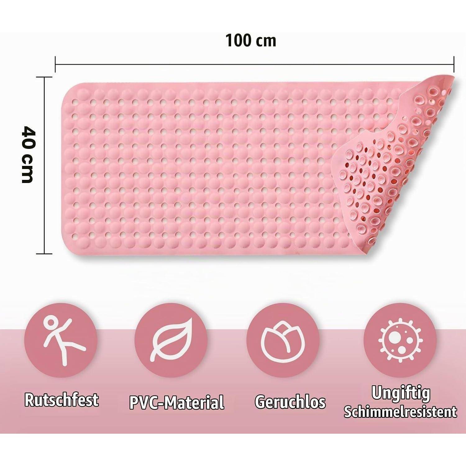 Rosa strukturierte Matte mit den Abmessungen 100 cm x 40 cm, gezeigt mit einer abgelösten Ecke, um die Unterseite mit Noppen-Grip-Oberfläche freizulegen; Symbole zeigen rutschfest, PVC, geruchlos, ungiftig, schimmelresistent.