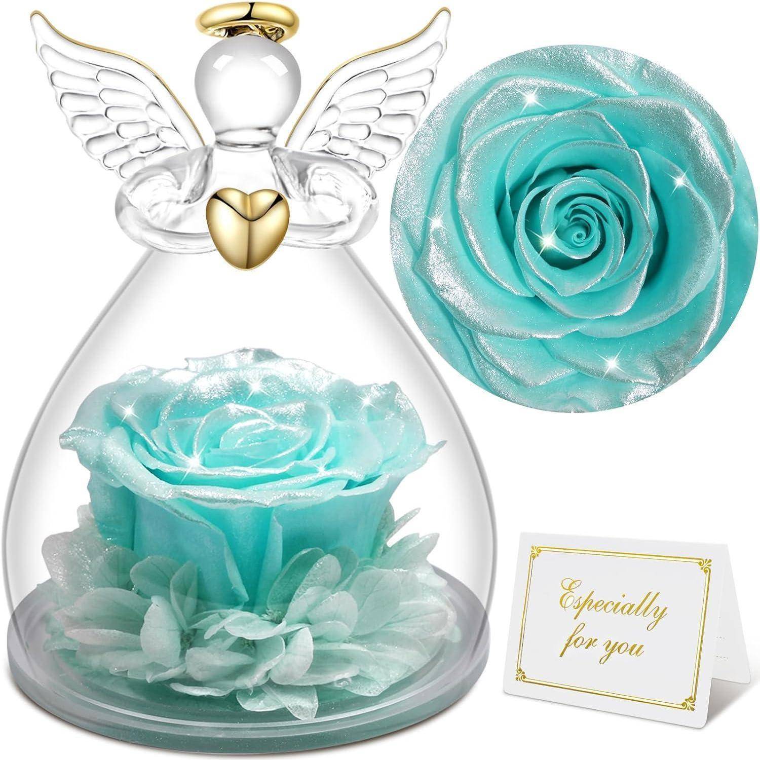 Dekoratives Geschenkset: Durchsichtige Engelsfigur mit türkiser Rose innen, detaillierte Nahaufnahme der Rose und eine Karte mit der Aufschrift „Ganz besonders für dich