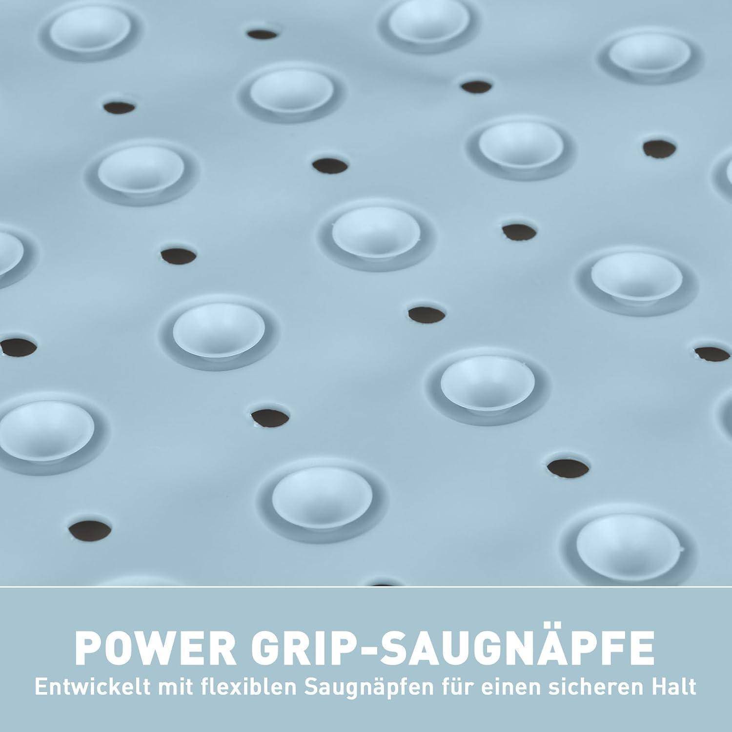 Blaue Perforationsmatte mit erhobenen Saugnäpfen und dem Text 'POWER GRIP-SAUGNÄPFE' sowie 'Entwickelt mit flexiblen Saugnäpfen für einen sicheren Halt'.