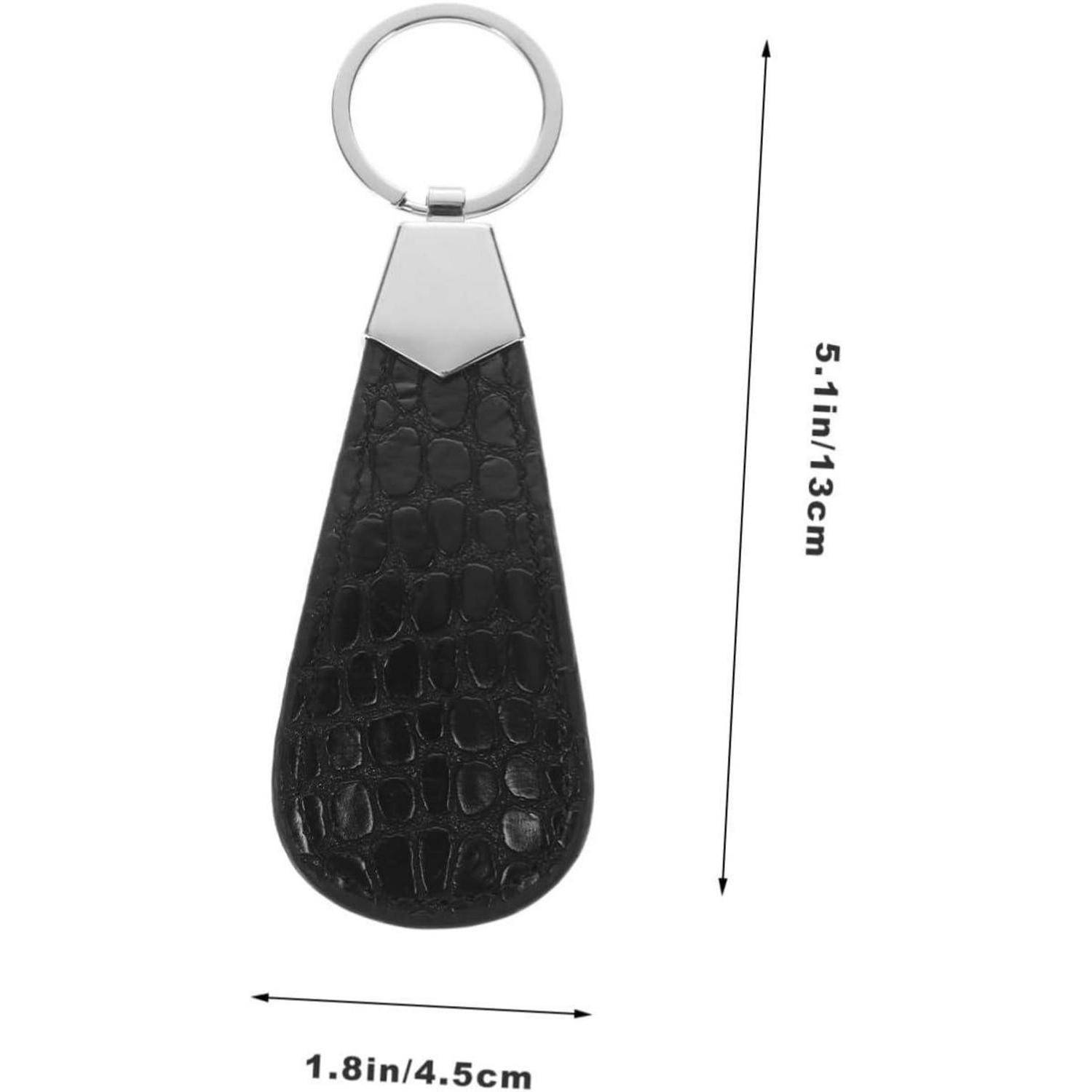 Schwarzer Leder-Schlüsselanhänger in Tropfenform mit silbernem Metallring, gezeigt mit den Abmessungen 5,1 Zoll/13 cm Länge und 1,8 Zoll/4,5 cm Breite.