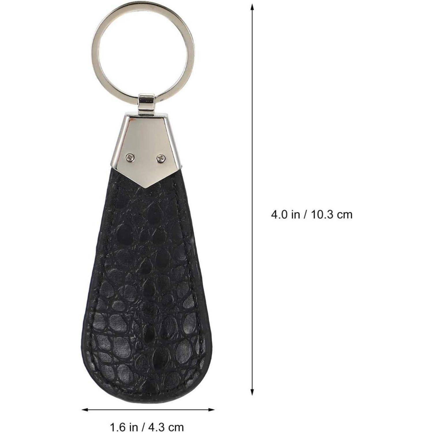 Schwarzer Leder-Schlüsselanhänger in Tropfenform mit silbernem Ring, gezeigt mit den Abmessungen 4,0 Zoll (10,3 cm) Höhe und 1,6 Zoll (4,3 cm) Breite.