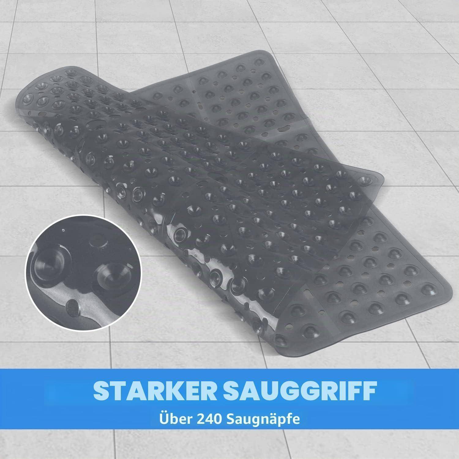 Schwarze Sauggriff-Matte mit hunderten Saugnäpfen auf einem Fliesenboden; die Vergrößerung zeigt eine Nahaufnahme des Napfmusters. Text: 'STARKER SAUGGRIFF' und 'Über 240 Saugnäpfe'.